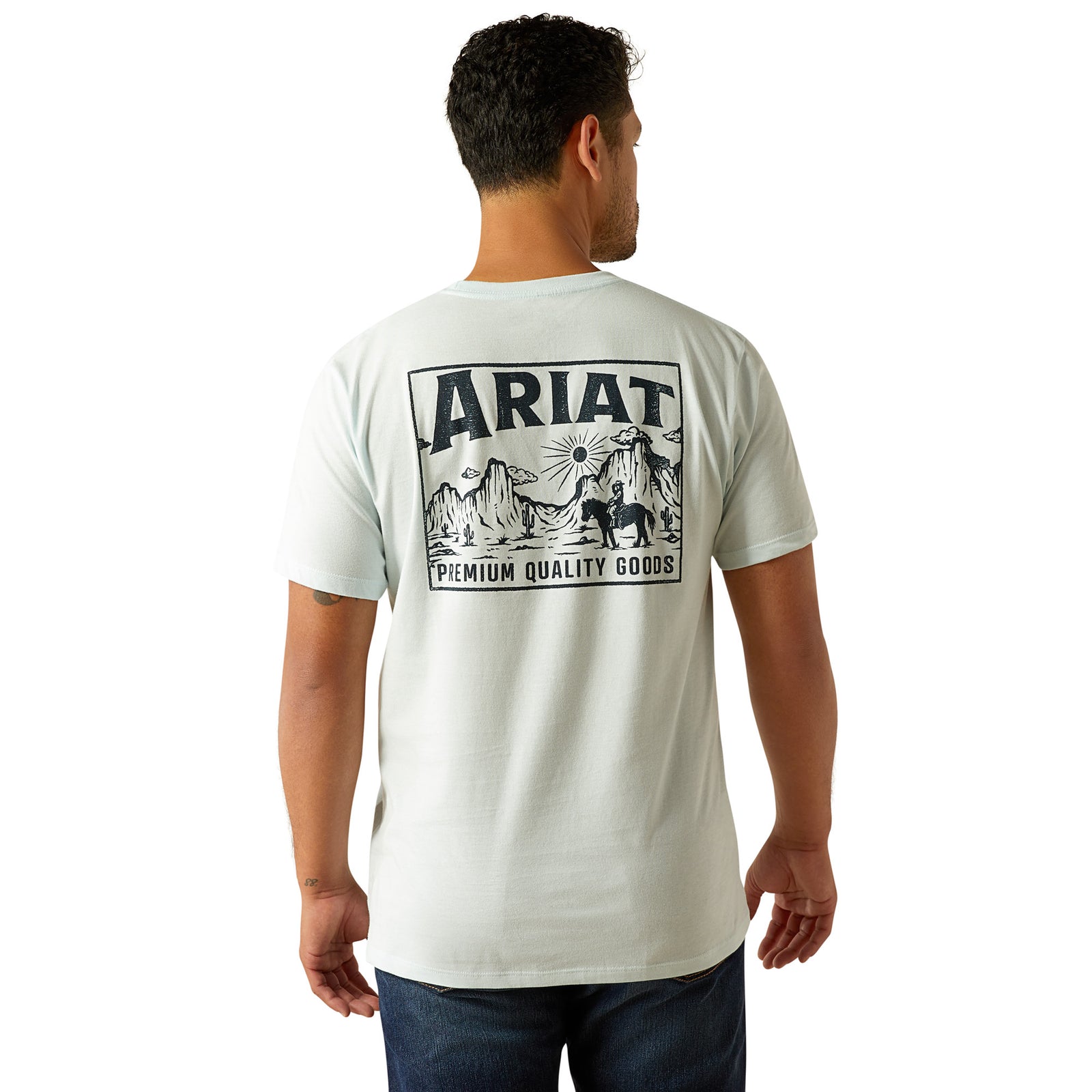 Ariat Men's Echo Valley T-Shirt. Man wearing a white t-shirt with Ariat logo and text on a white background