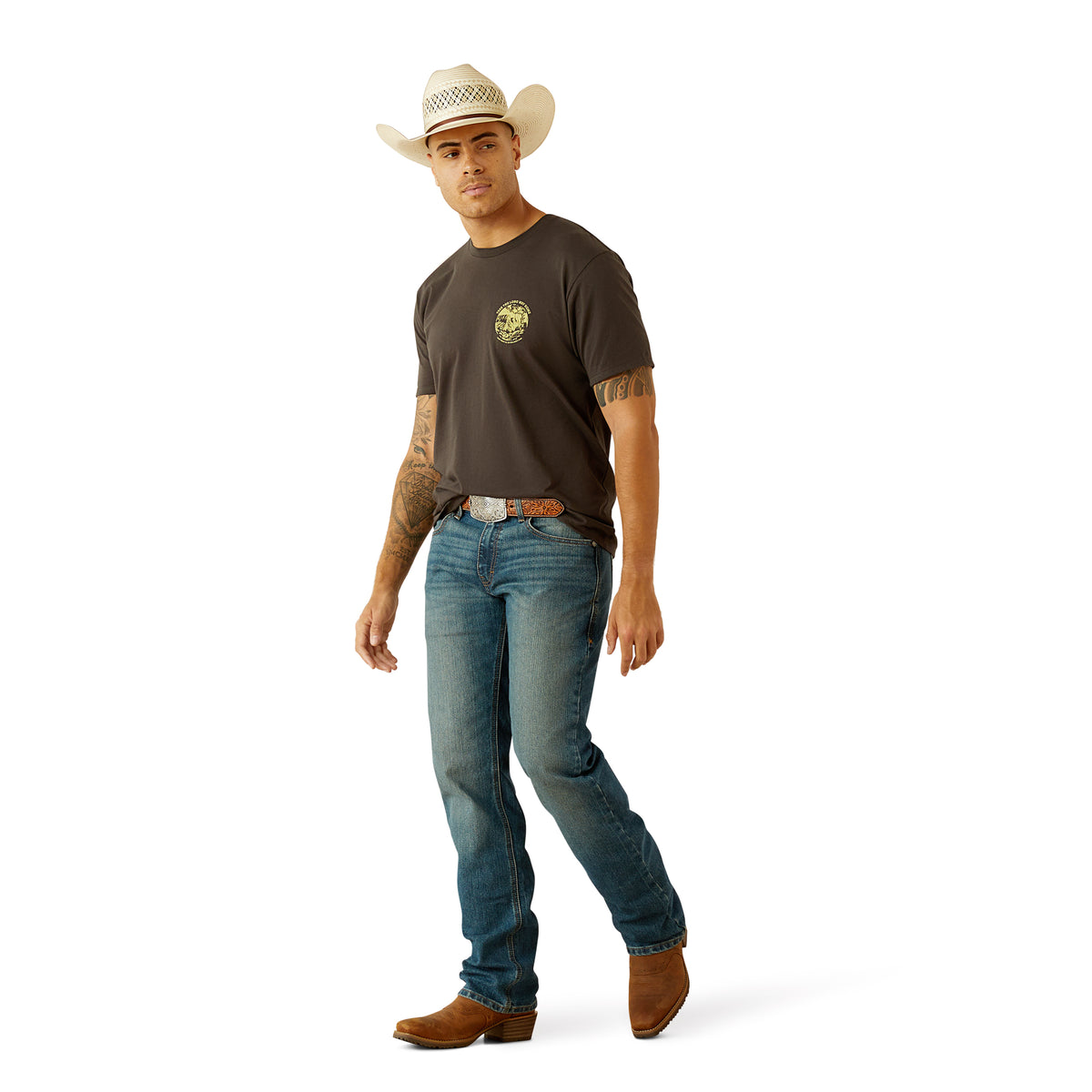 Ariat Men's Take the Long Way T-Shirt. Man wearing a cowboy hat, brown shirt, blue jeans, and brown boots on a white background