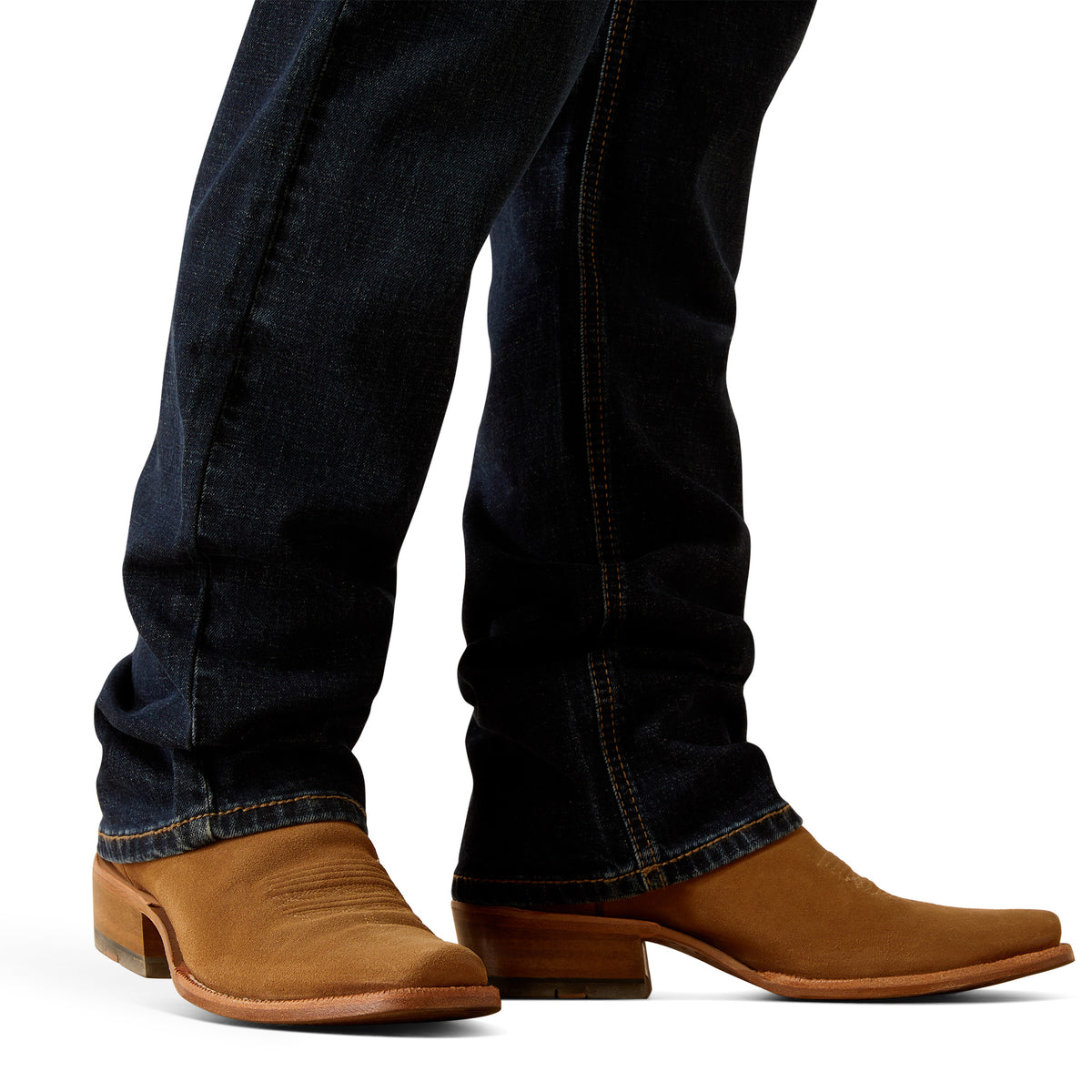 Ariat Men's M5 Dexter Straight Leg Jean. Brown cowboy boots worn with dark blue jeans on a white background