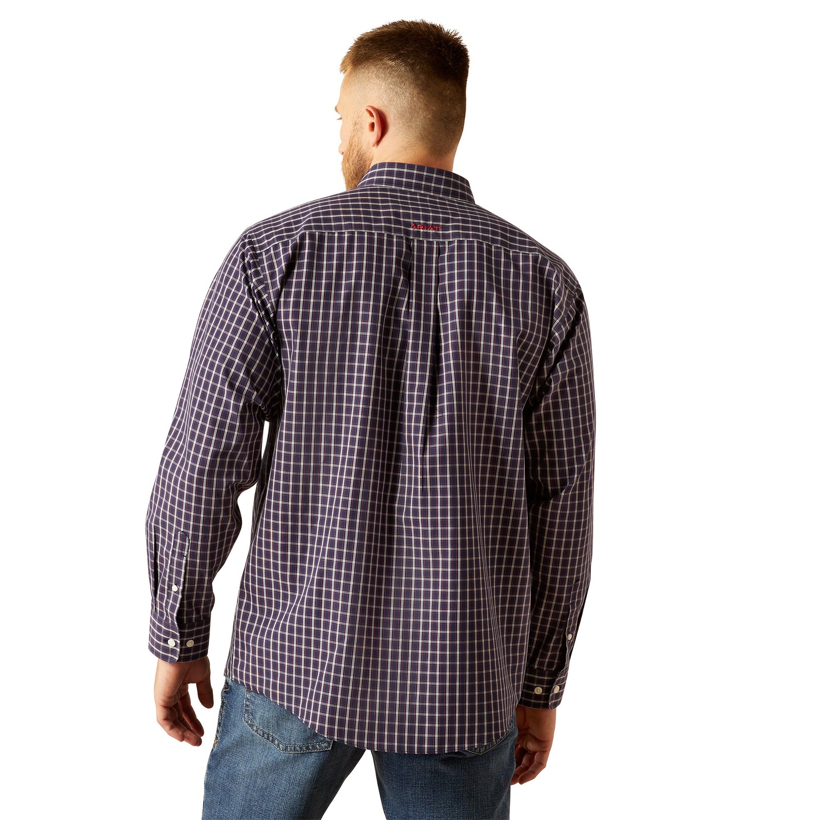 Ariat Men's Wrinkle Free Dwayne L/S Western Shirt. Man wearing a plaid shirt and jeans on a white background