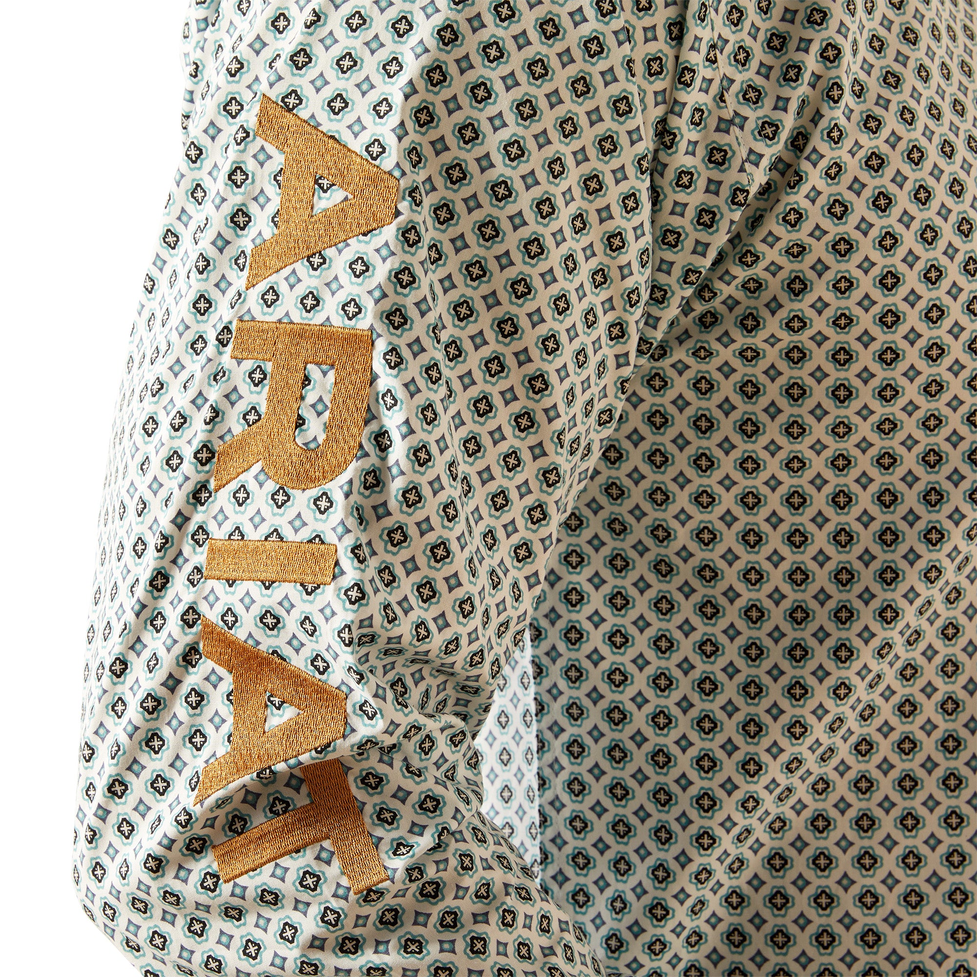 Ariat Men's Team Franklin L/S Western Shirt. Patterned fabric with 'Ariat' branding on a white background