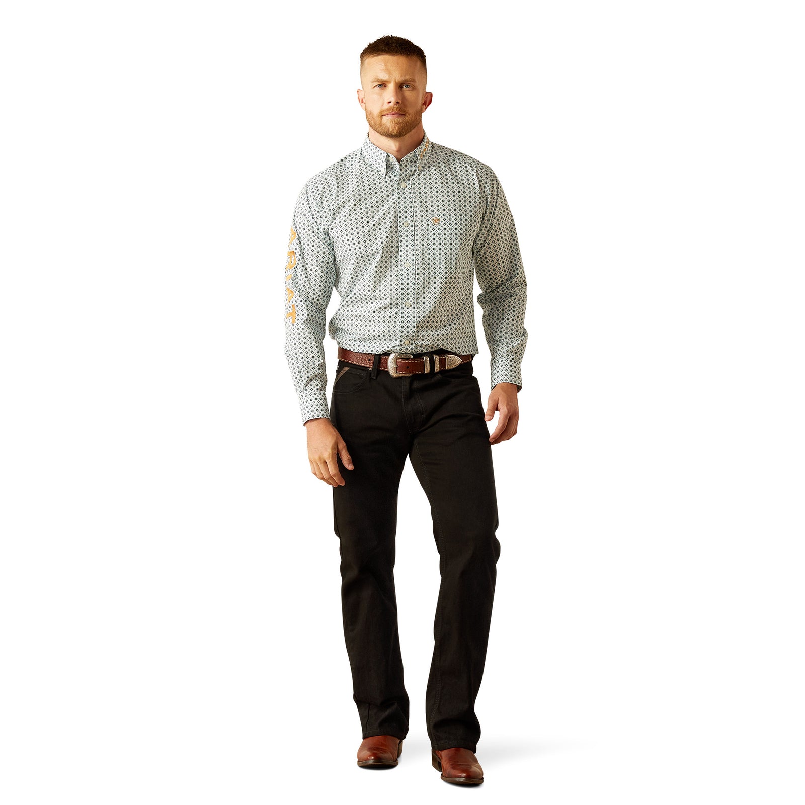 Ariat Men's Team Franklin L/S Western Shirt. Man wearing a patterned shirt and black pants on a white background