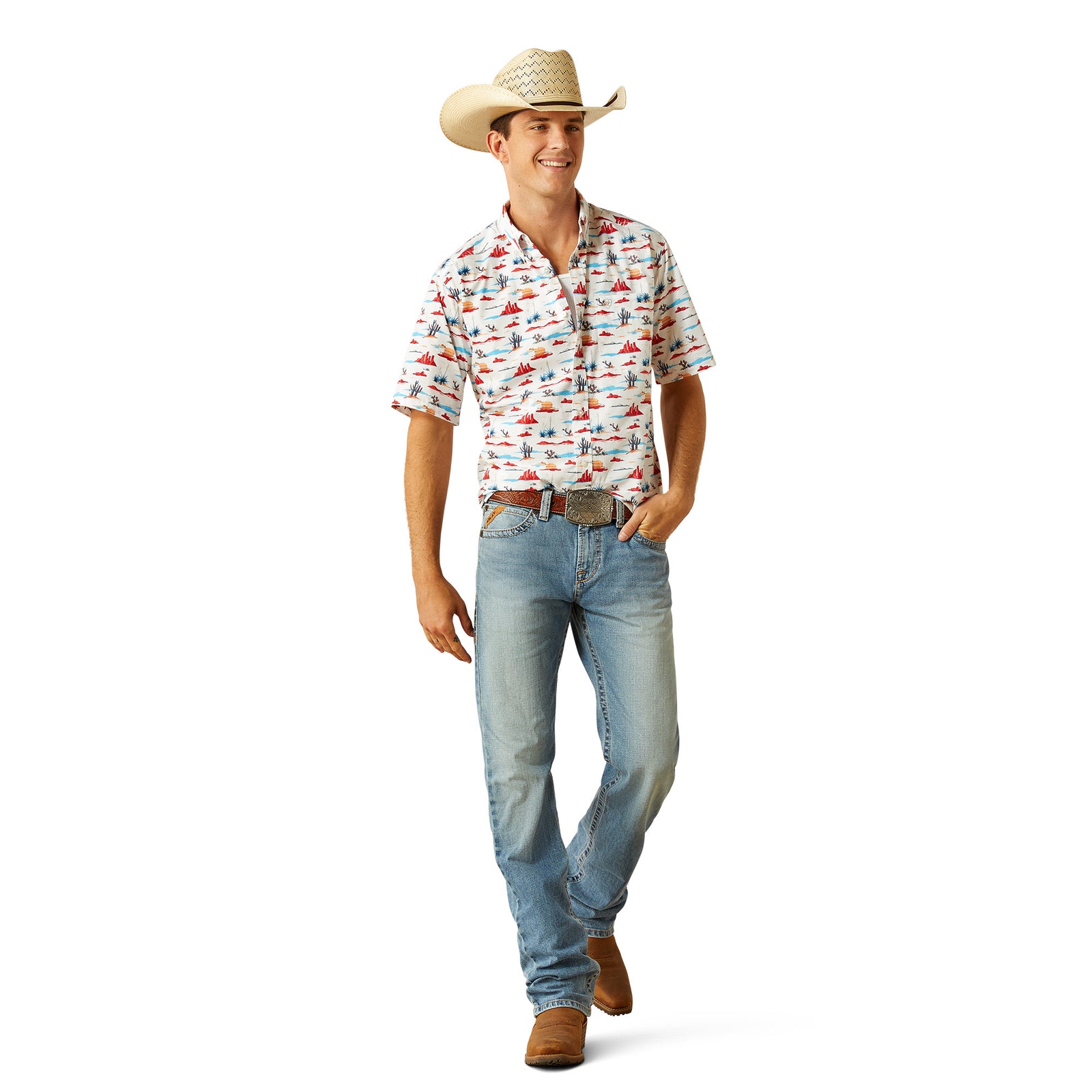 Ariat Men's Scout S/S Western Shirt. Man wearing a patterned shirt, jeans, and a cowboy hat on a white background