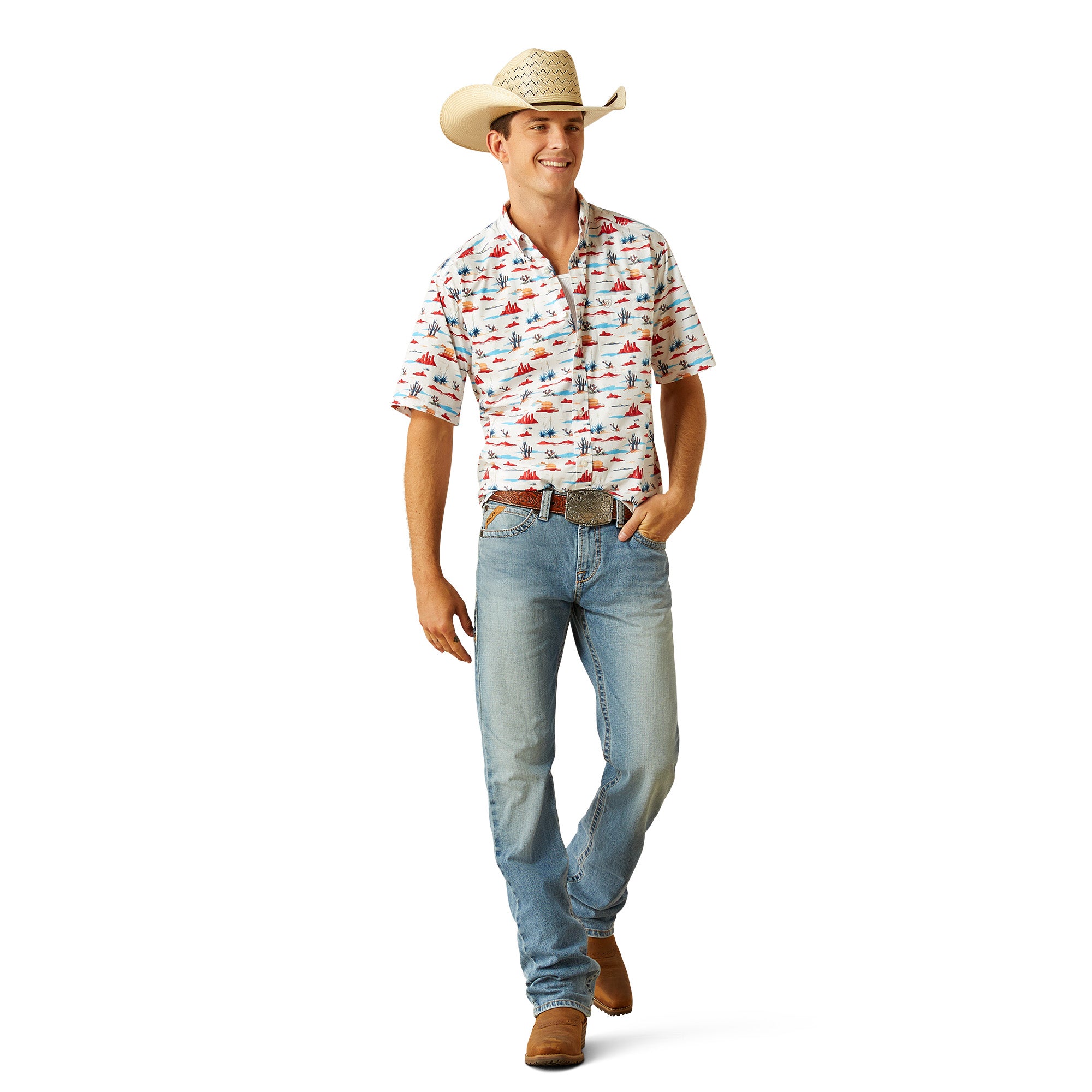 Ariat Men's Scout S/S Western Shirt. Man wearing a patterned shirt, jeans, and a cowboy hat on a white background