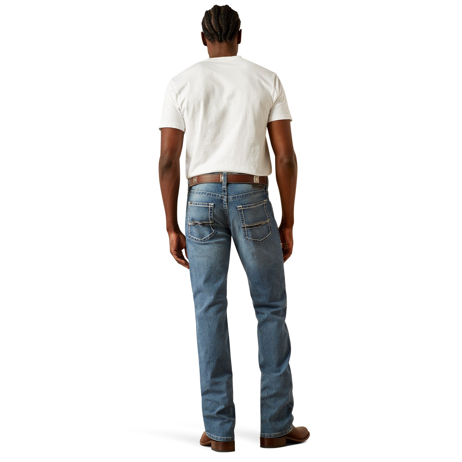 Ariat Men's M5 Forrest Straight Leg Jeans. Person wearing blue jeans and a white shirt on a white background
