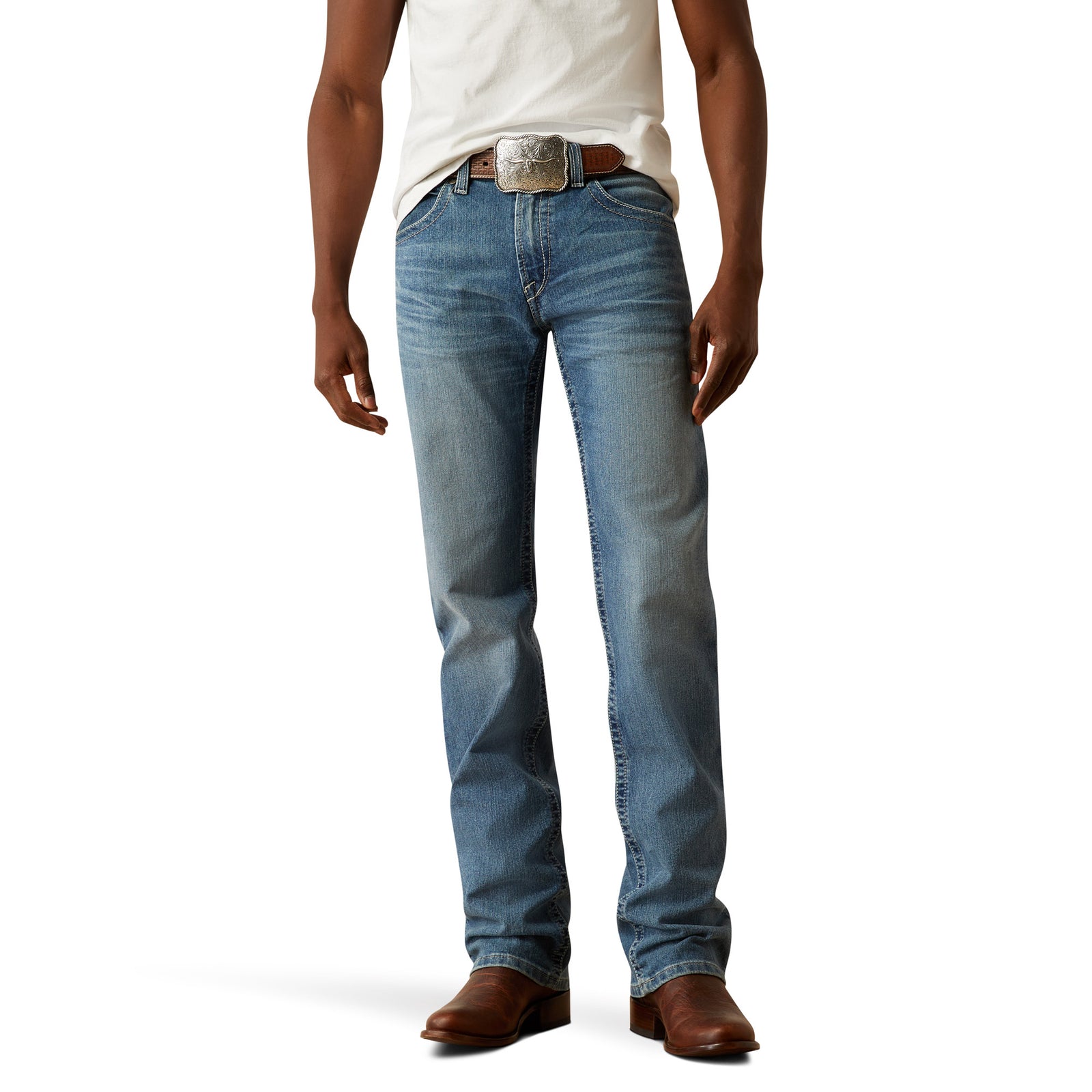 Ariat Men's M5 Forrest Straight Leg Jeans. Person wearing blue jeans and a white shirt on a white background