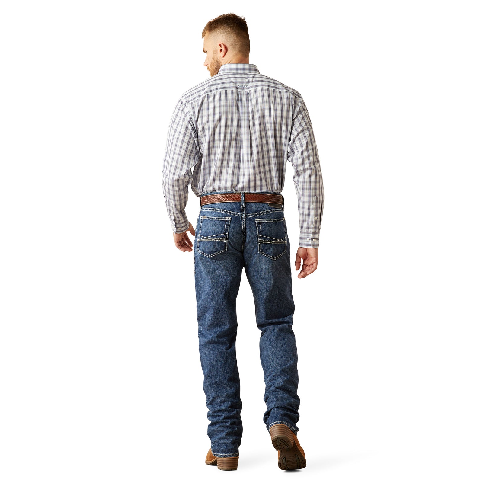 Ariat Men's M2 Camilo Boot Cut Jean. Person wearing blue jeans and a plaid shirt on a white background