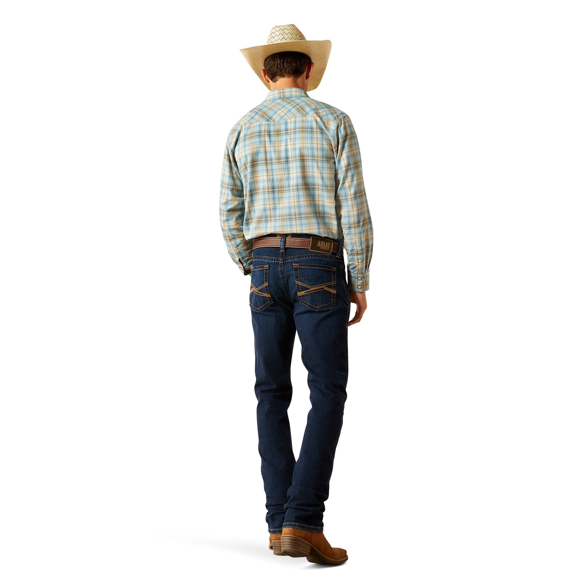 Ariat Men's M8 Modern Shawn Straight Leg Jean. Person wearing blue jeans, a plaid shirt, and brown boots on a white background