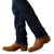 Ariat Men's M8 Modern Shawn Straight Leg Jean. Brown leather shoes worn with blue jeans on a white background