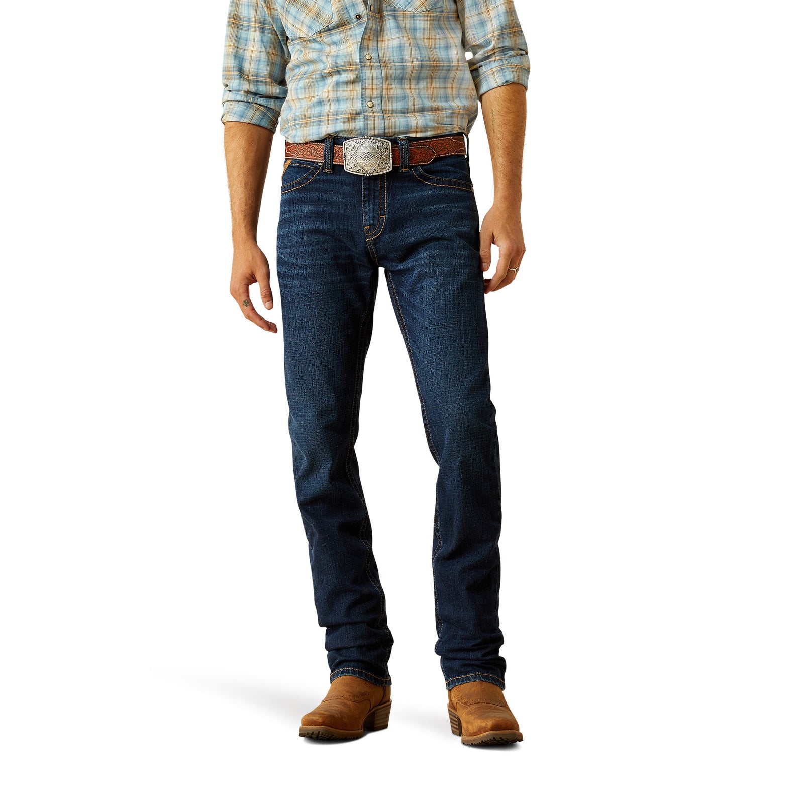 Ariat Men's M8 Modern Shawn Straight Leg Jean. Person wearing blue jeans, a plaid shirt, and brown boots on a white background