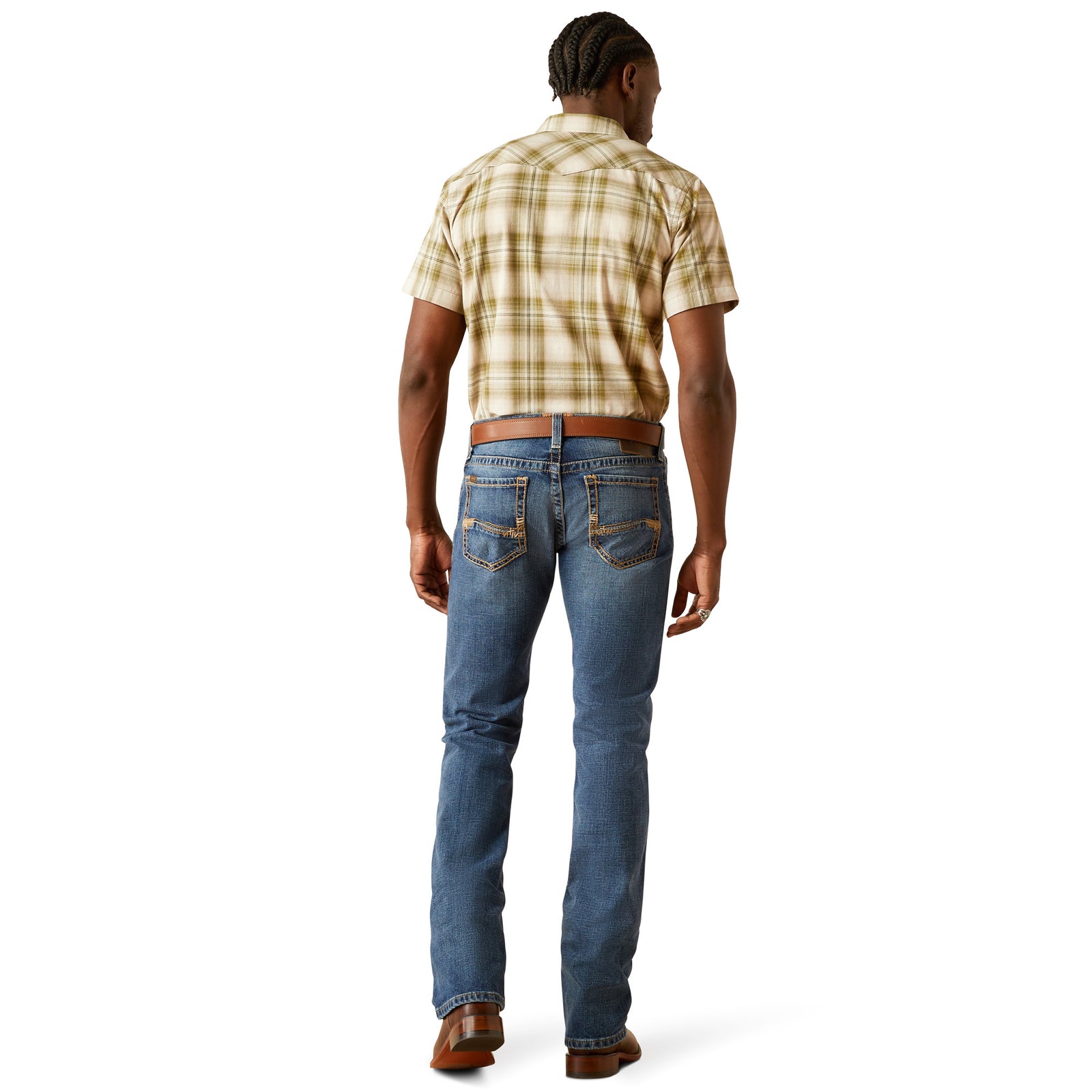 Ariat Men's M7 Travis Straight Leg Jeans. Person wearing blue jeans and a plaid shirt on a white background