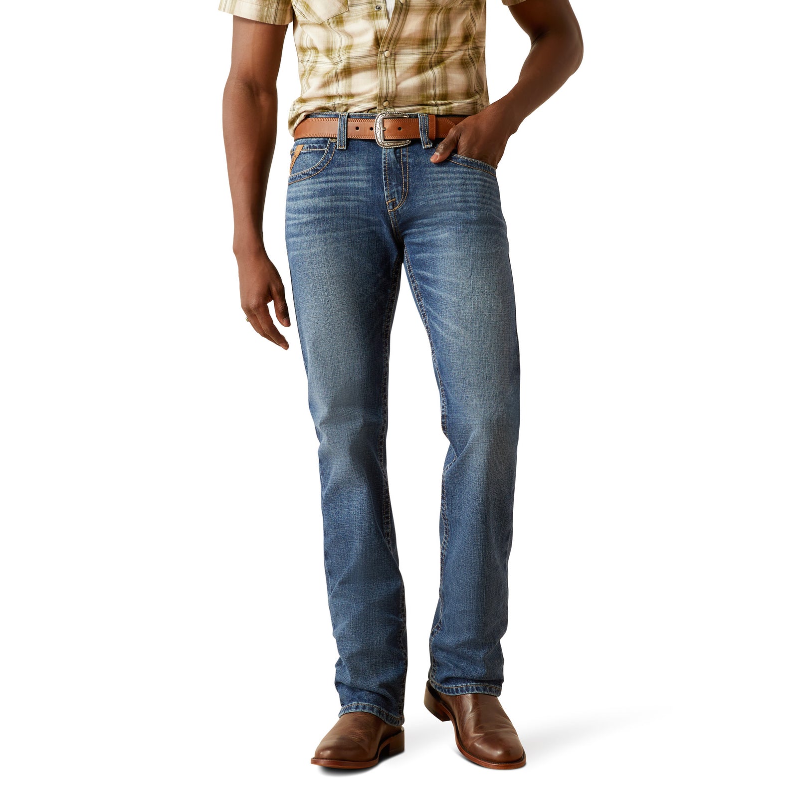 Ariat Men's M7 Travis Straight Leg Jeans. Person wearing blue jeans and a plaid shirt on a white background