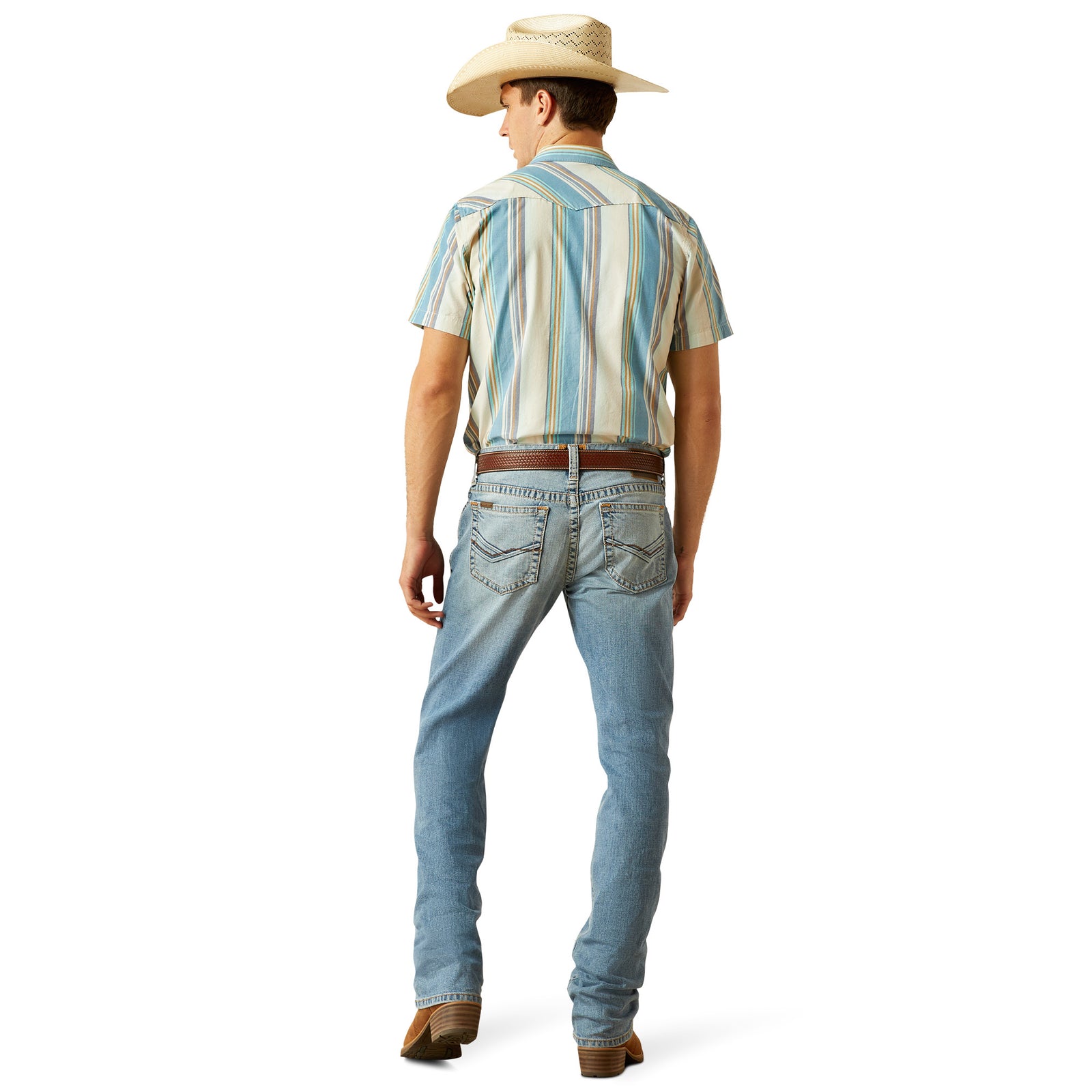Ariat Men's M7 Tustin Slim Fit Straight Leg Jean. Person wearing light blue jeans and a striped shirt on a white background