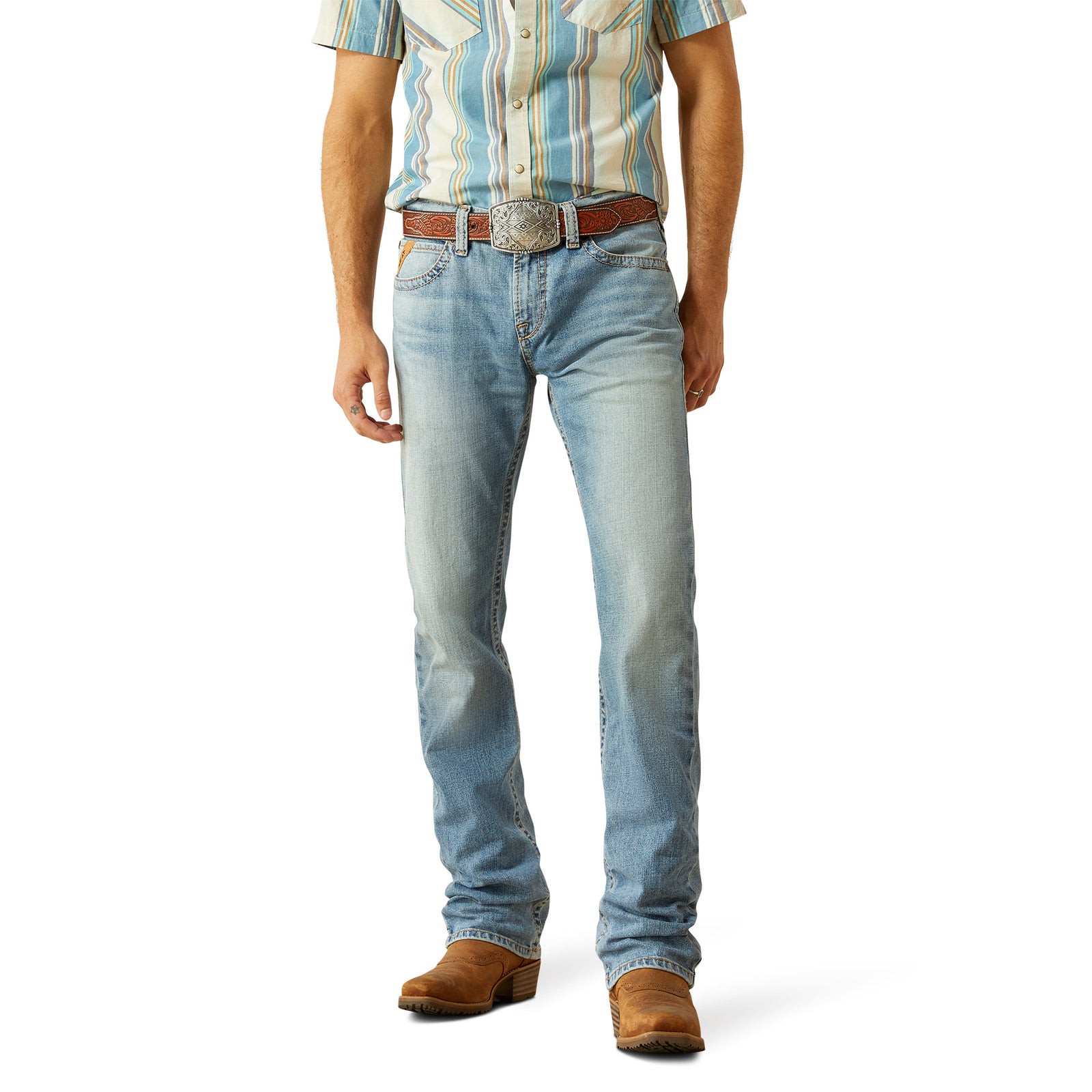 Ariat Men's M7 Tustin Slim Fit Straight Leg Jean. Person wearing light blue jeans and a striped shirt on a white background