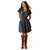 Ariat Women's Stellar Dress. Woman wearing a denim dress and brown boots on a white background