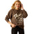 Ariat Women's Oversized Crew Sweatshirt. Woman wearing a brown sweatshirt with 'Ariat' branding on a white background
