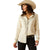 Ariat Women's Bluebell L/S Western Shirt. Woman wearing a beige button-up shirt and black pants with a straw hat on a white background