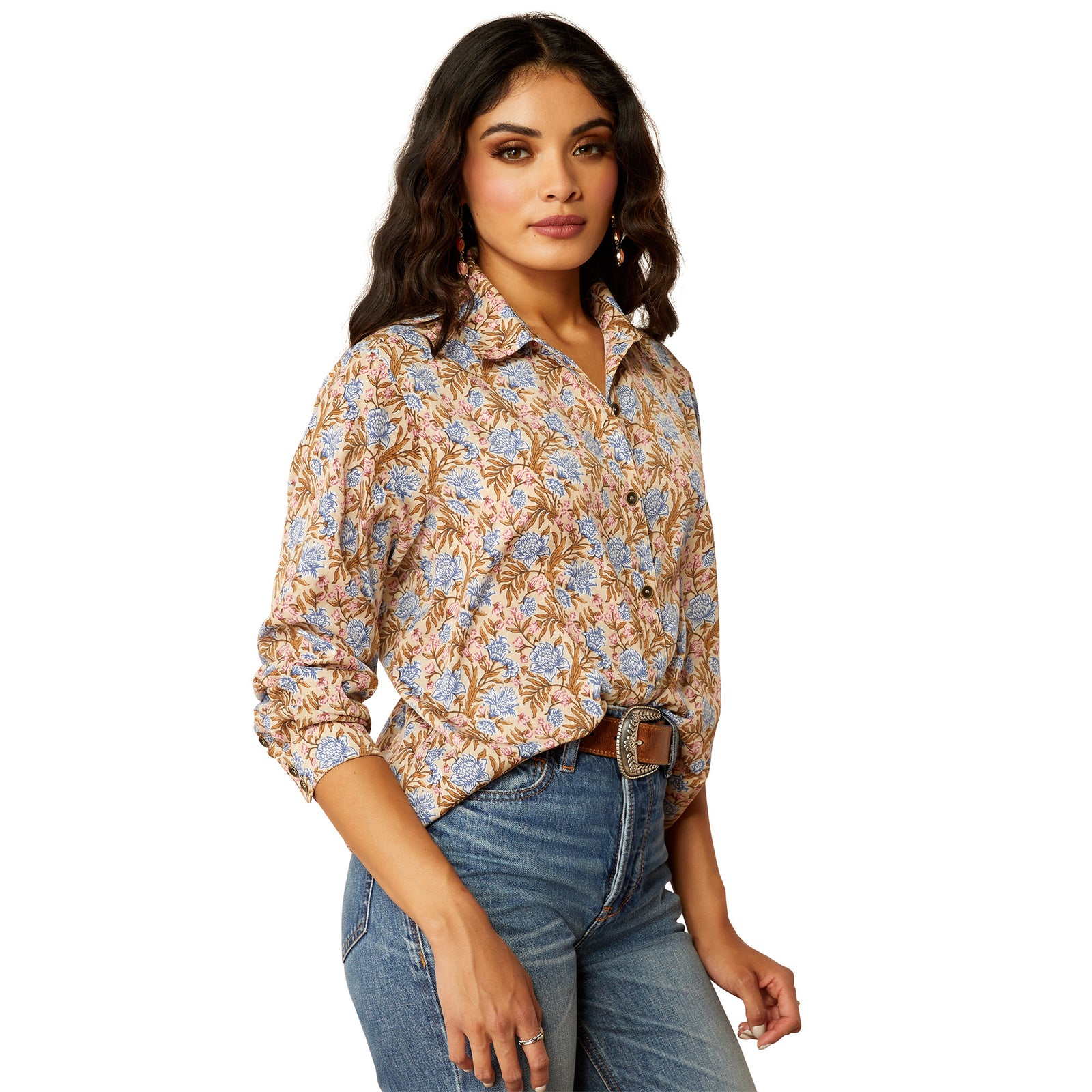 Ariat Women's Homestyle Button Up L/S Western Shirt. Woman wearing a floral shirt and jeans on a white background