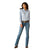 Ariat Women's Wrinkle Resistant Team Kirby Western Shirt. Woman wearing a light blue shirt and jeans on a white background