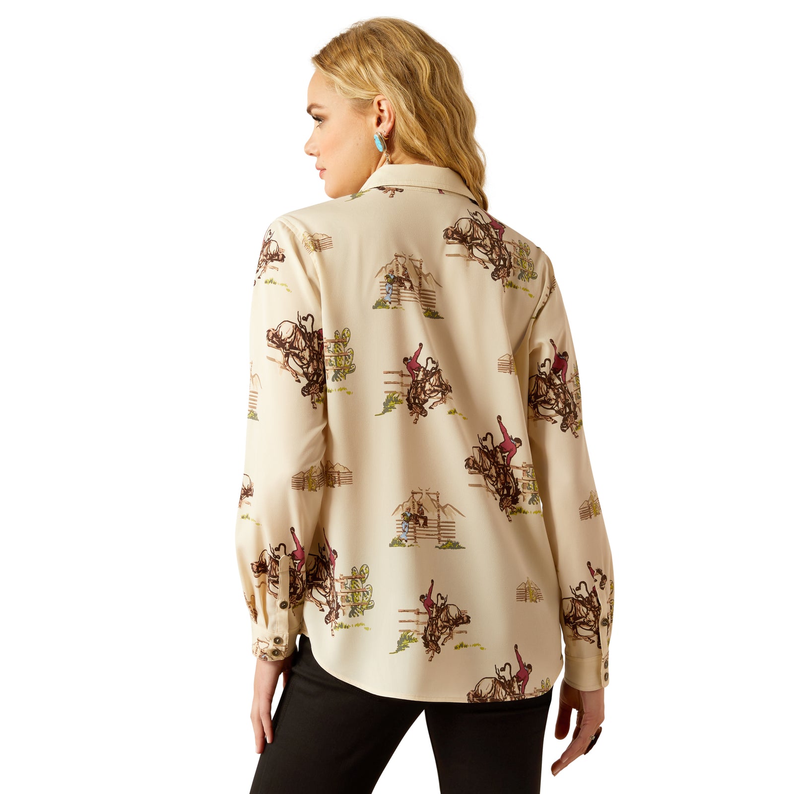 Ariat Women's Homestyle Button Up L/S Western Shirt. Woman wearing a beige blouse with horse print on a white background