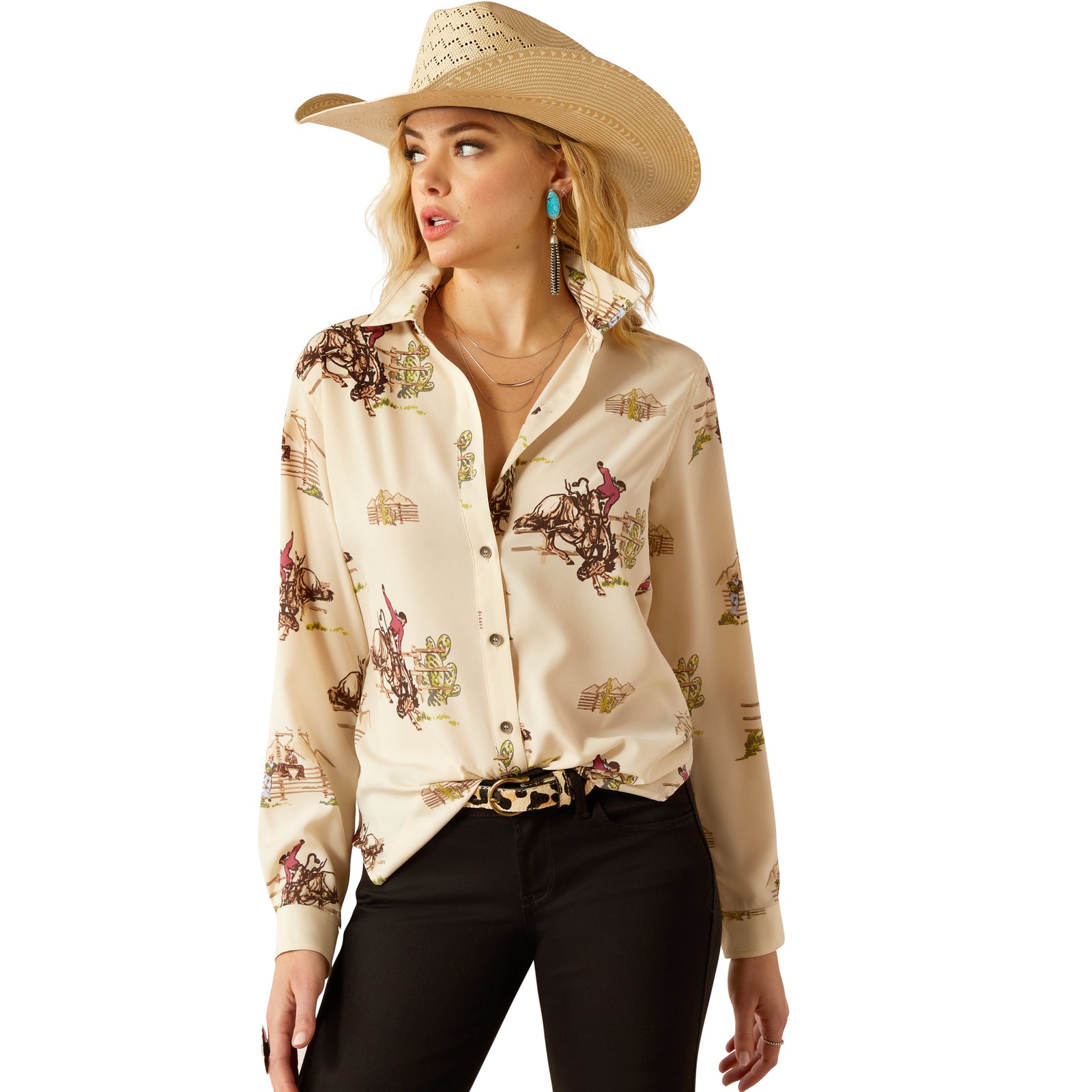 Ariat Women's Homestyle Button Up L/S Western Shirt. Woman wearing a patterned shirt and cowboy hat on a white background