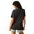 Àriat Women's Rodeo Girls T-Shirt. Woman wearing a black t-shirt and light denim shorts on a white background