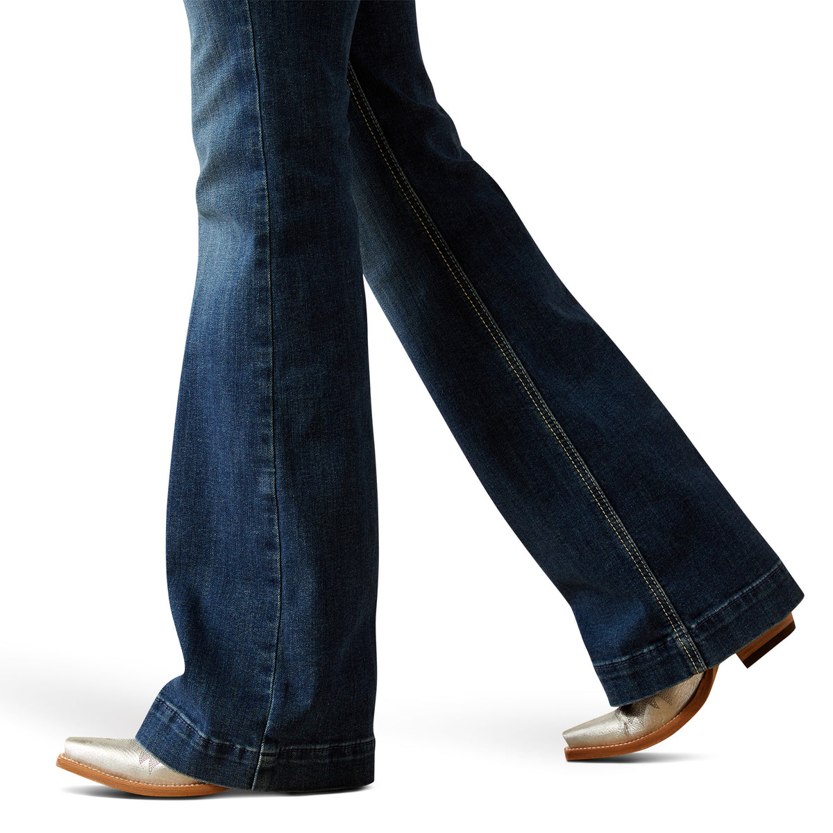 Ariat Women's Paula High Rise Slim Trouser. Blue jeans worn by a person on a white background