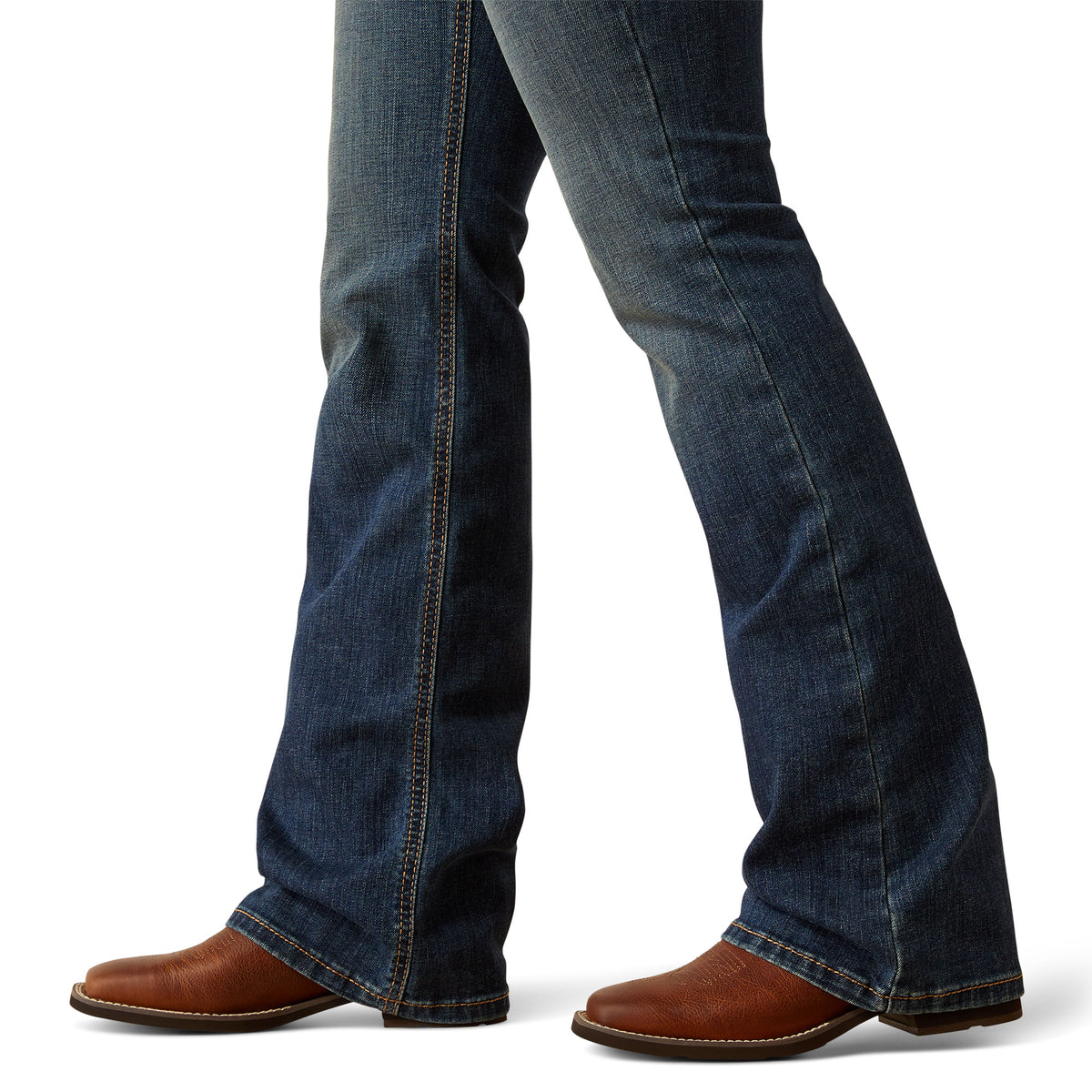 Ariat Women's Sonia Mid Rise Boot Cut Jean. Blue jeans worn by a person on a white background