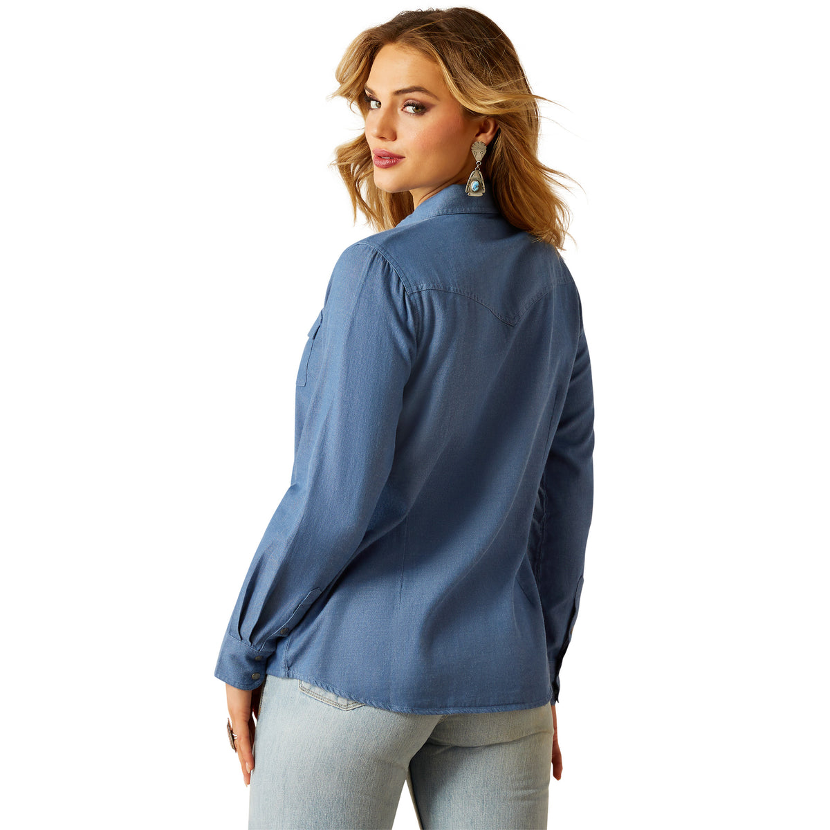 Ariat Women's Everyday Western Snap L/S Shirt. Woman wearing a blue shirt on a white background