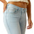 Ariat Women's June Perfect Rise Flare Jean. Light blue jeans worn by a person on a white background