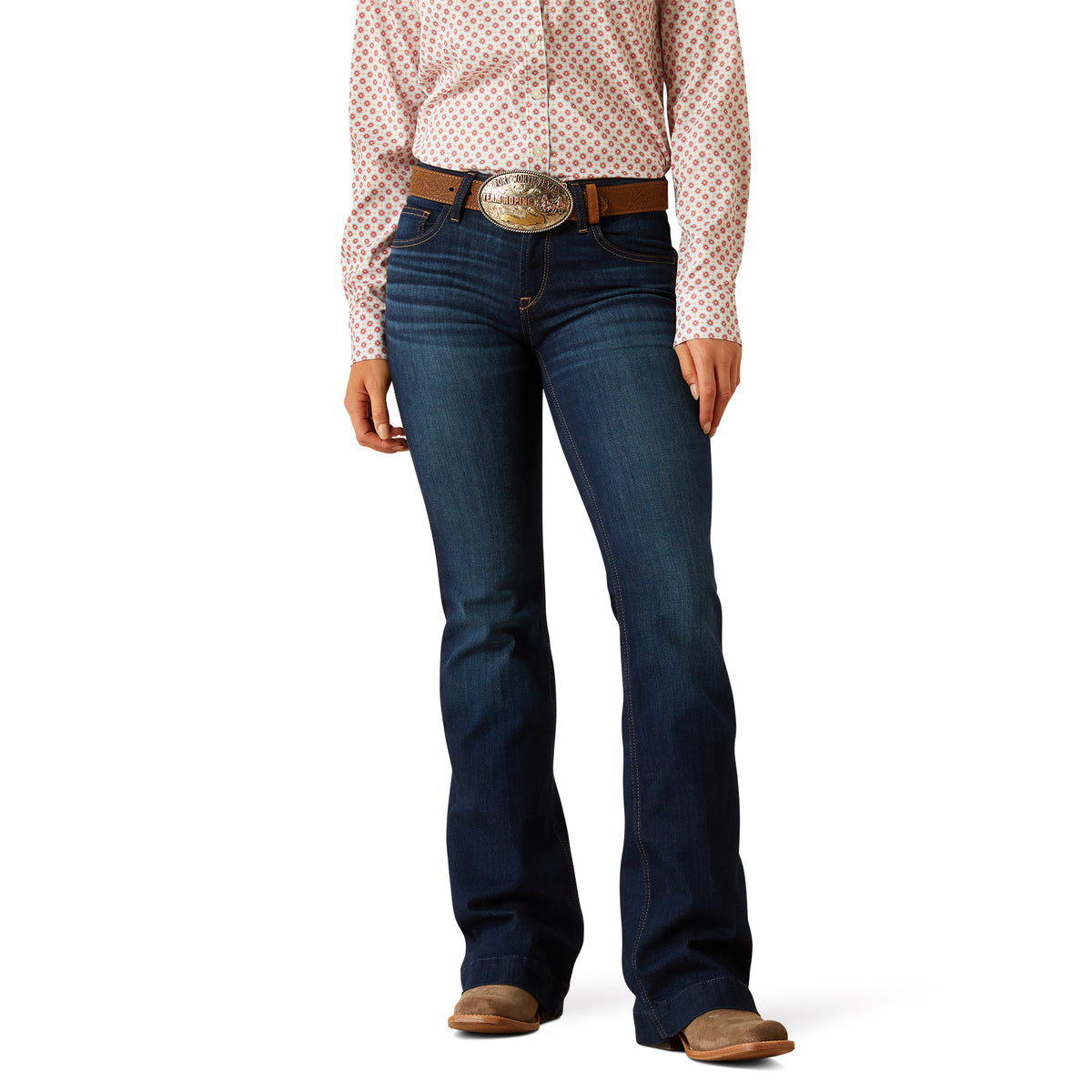 Ariat Women&#39;s Juliana Perfect Rise Trouser Jean. Person wearing blue jeans and a patterned shirt on a white background