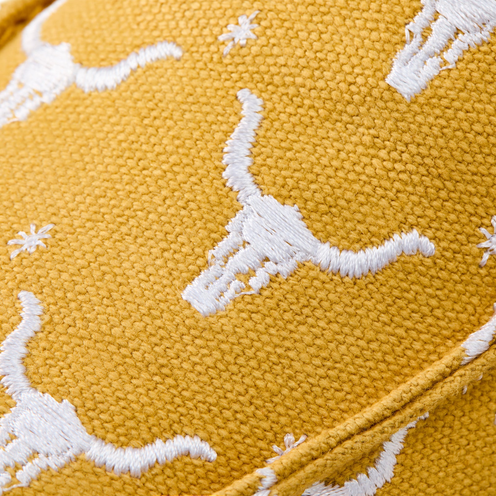 Ariat Women's Hilo Doodle Slip On Shoe in yellow with embroidered patterns and white laces.