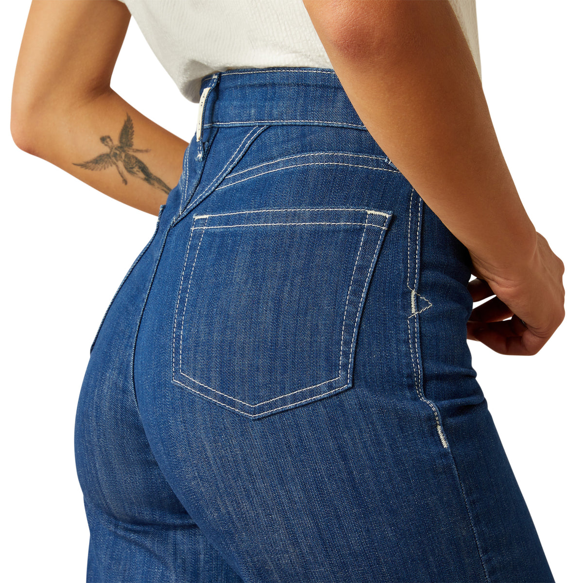 Ariat Women's Westie Ultra High-Rise Wide Leg Jean. Person wearing blue jeans on a white background