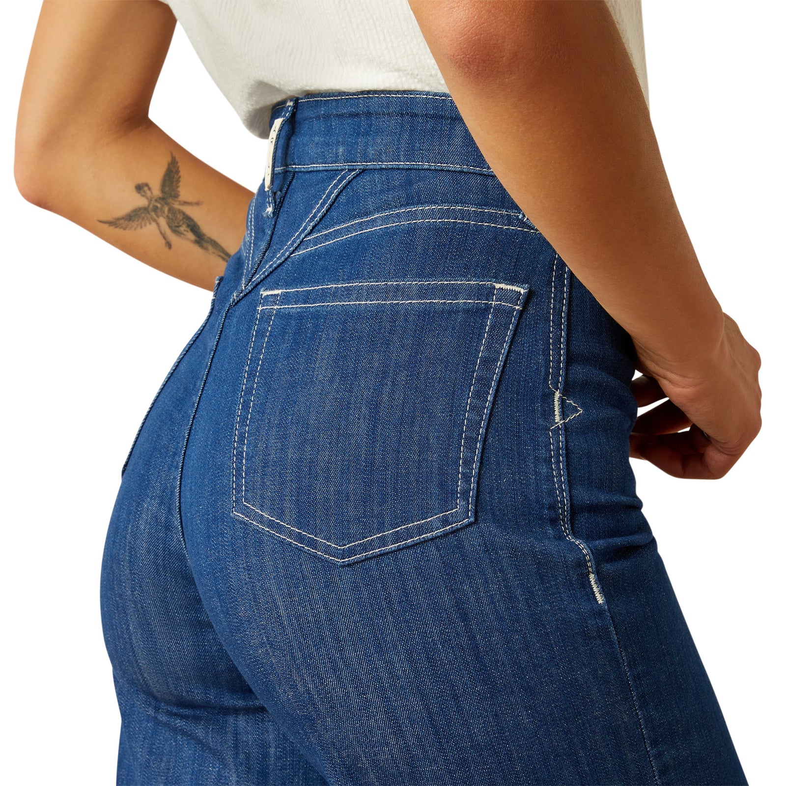 Ariat Women's Westie Ultra High-Rise Wide Leg Jean. Person wearing blue jeans on a white background