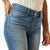 Ariat Women's Elaina High Rise Slim Trouser Jean. Blue jeans worn by a person on a white background