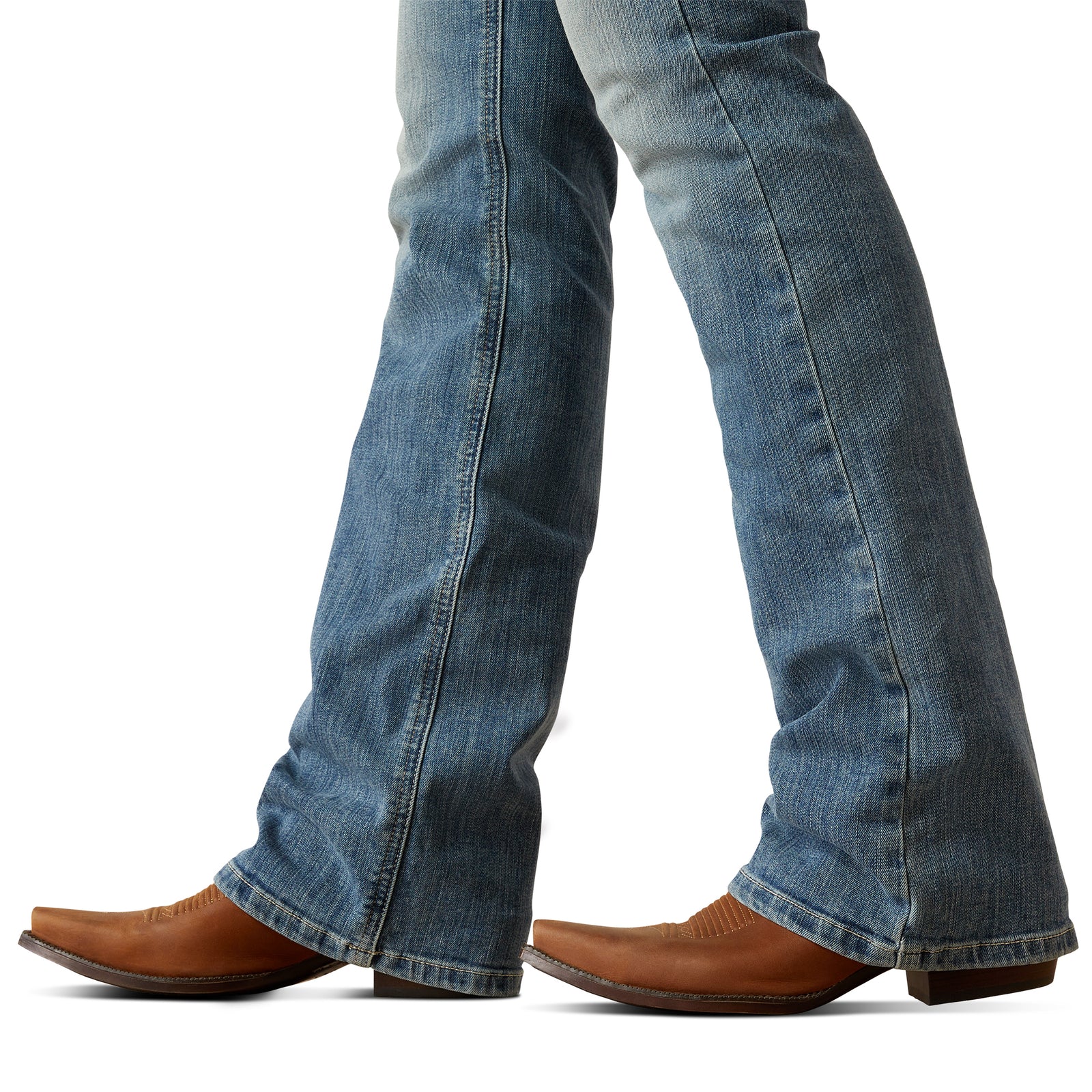 Ariat Women's Cecilia High Rise Boot Cut Jean. Close-up of blue jeans and brown cowboy boots on a white background