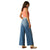 Ariat Women's Jazmine Ultra High-Rise Wide Leg Jean. Person wearing blue jeans and a red shirt on a white background