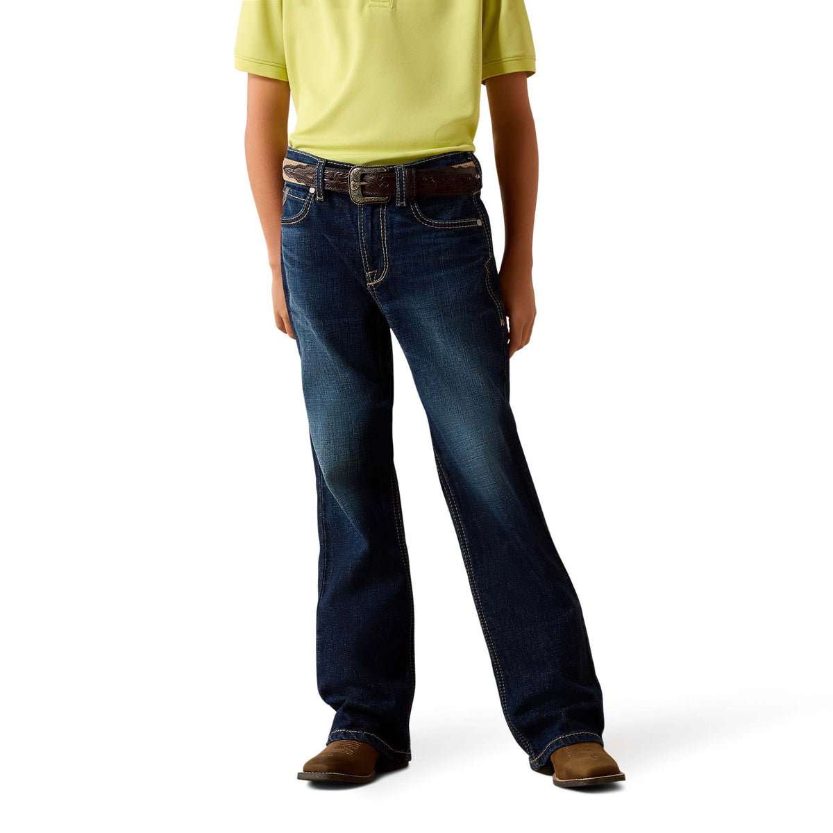 Person wearing blue jeans and a yellow shirt on a white background