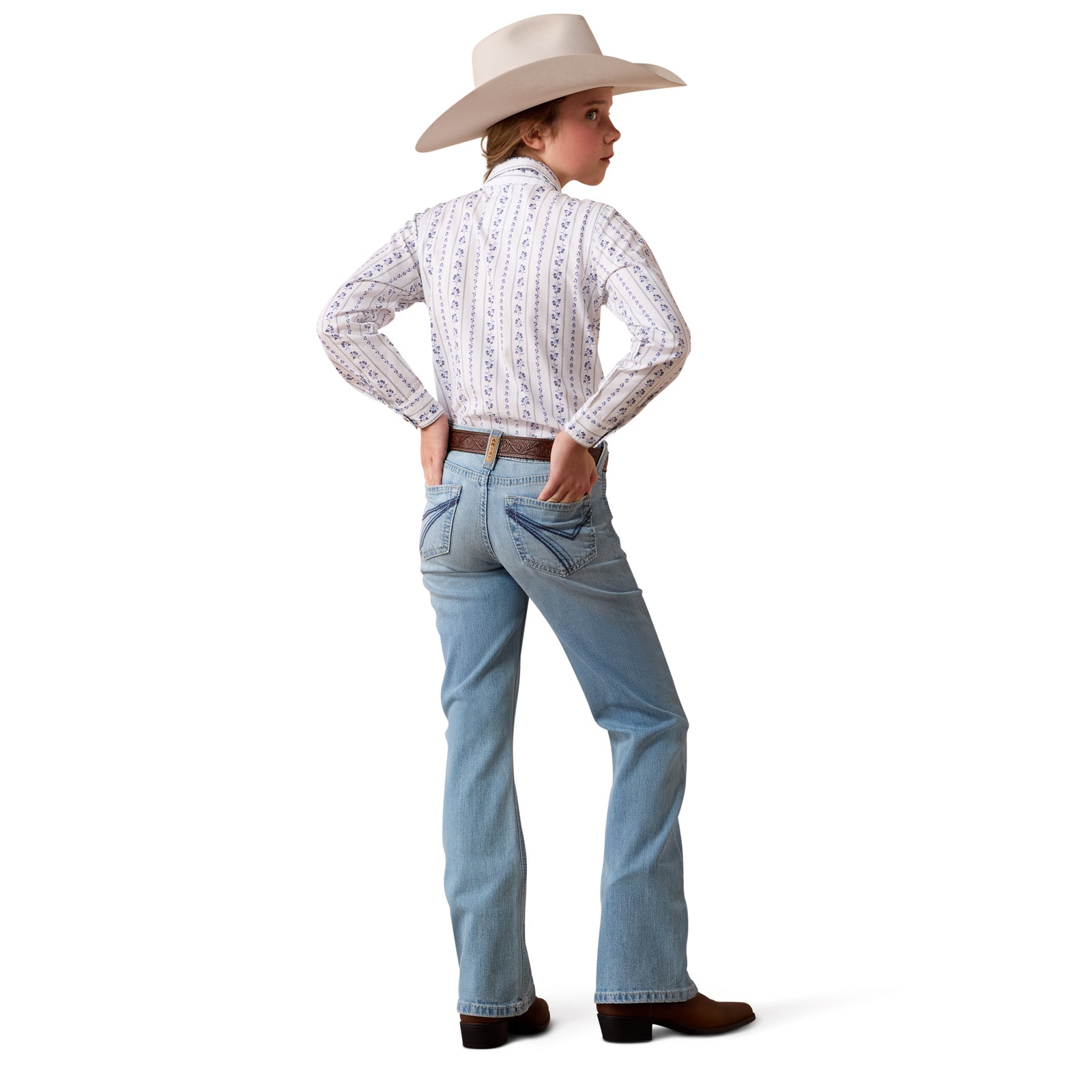 Person wearing a white patterned shirt, blue jeans, and a beige cowboy hat on a white background