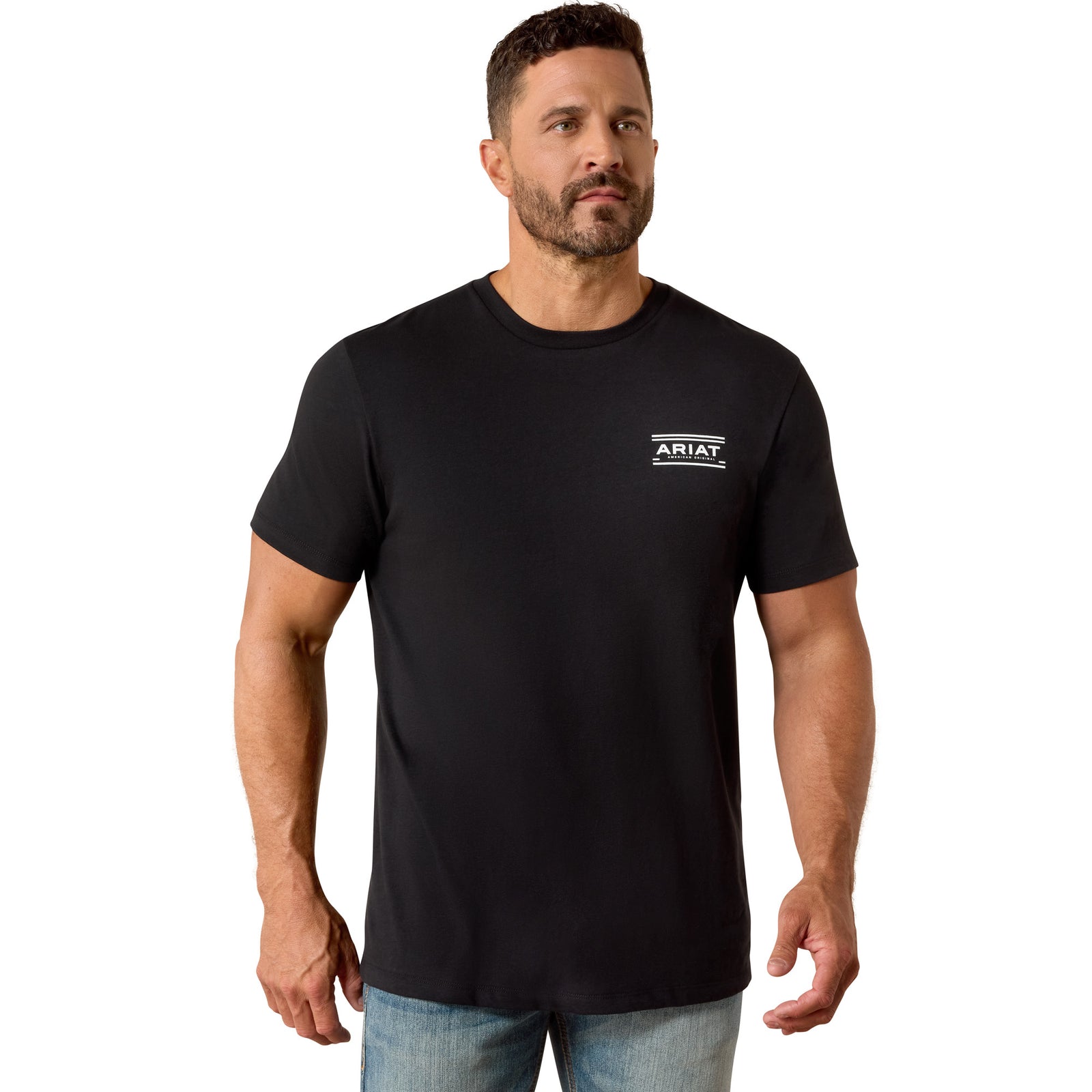 Man wearing a black Ariat t-shirt with a geometric design on the back against a white background
