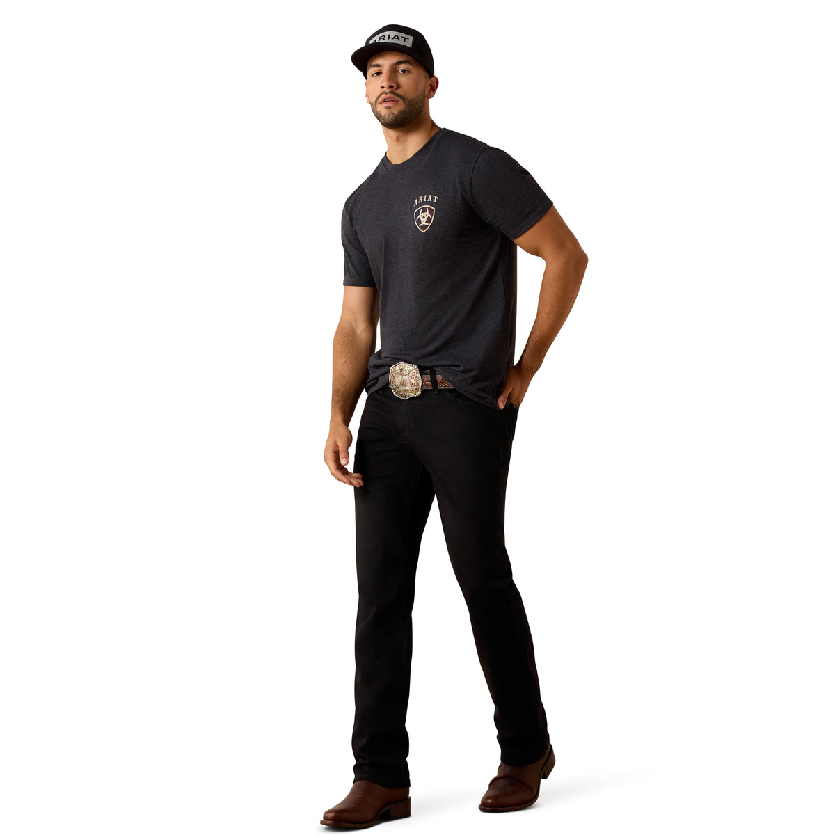 Man wearing a black t-shirt with a logo and black pants on a white background