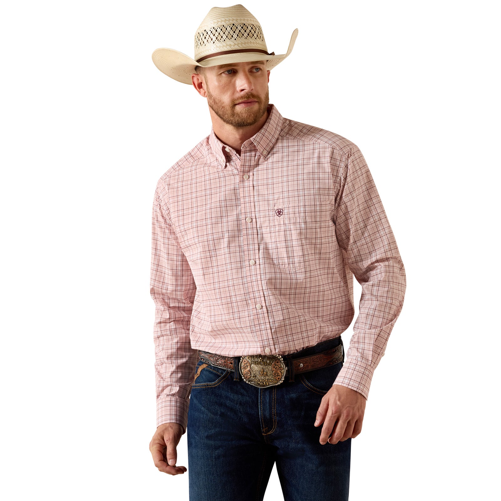 Man wearing a pink plaid shirt, blue jeans, and a cowboy hat on a white background