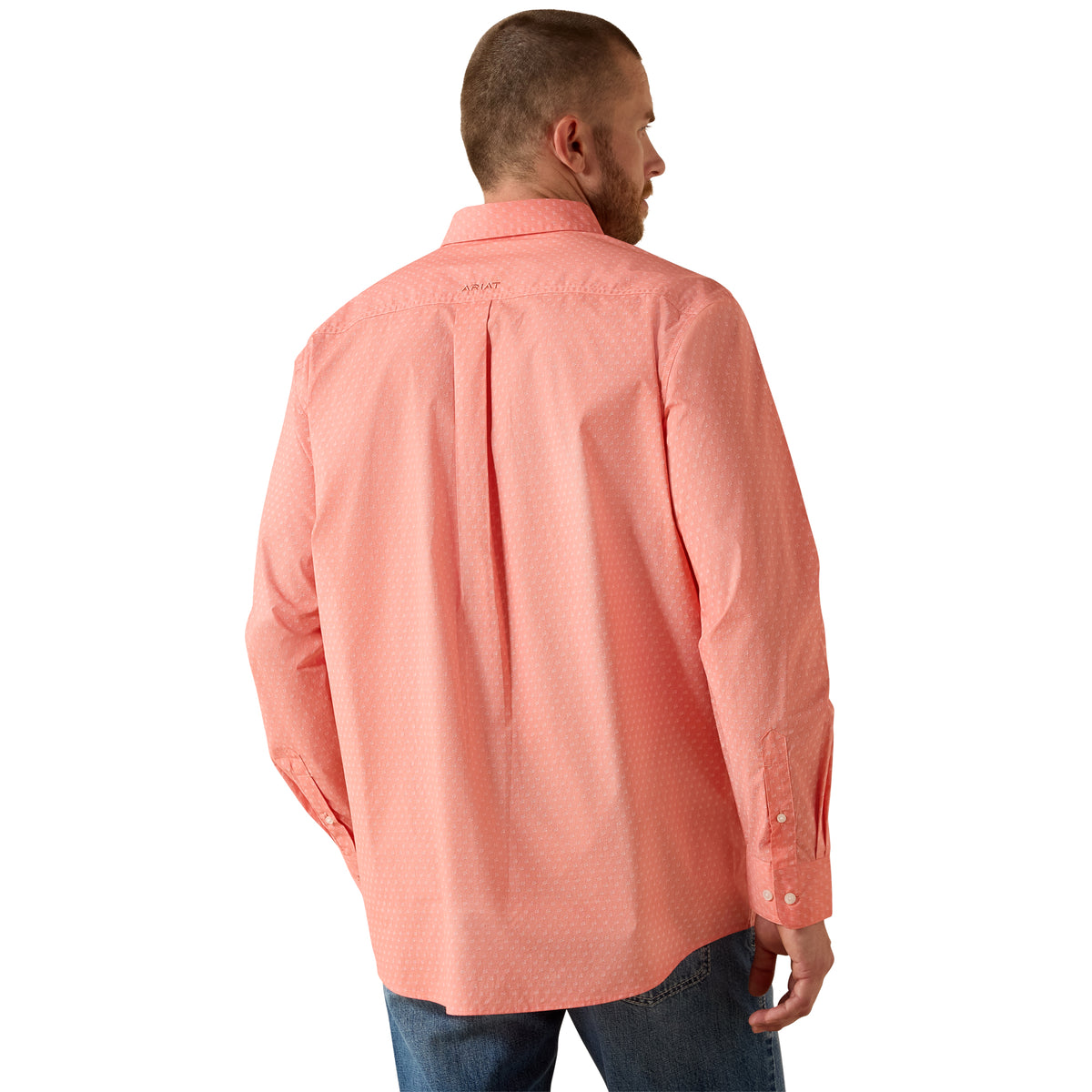 Man wearing a pink shirt on a white background