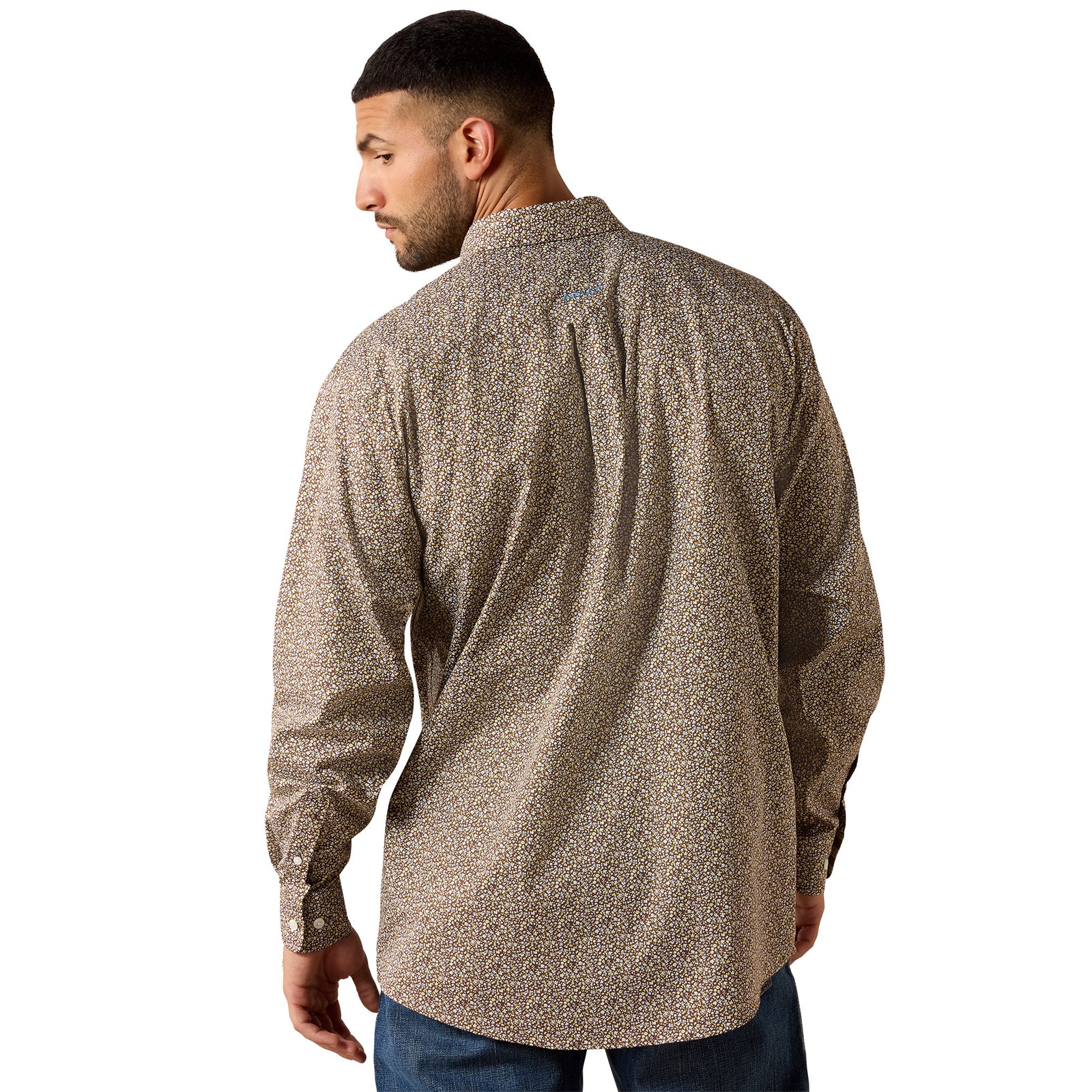 A man wearing a long-sleeve button-down shirt with a dense micro-pattern, shown from the back against a plain white background.