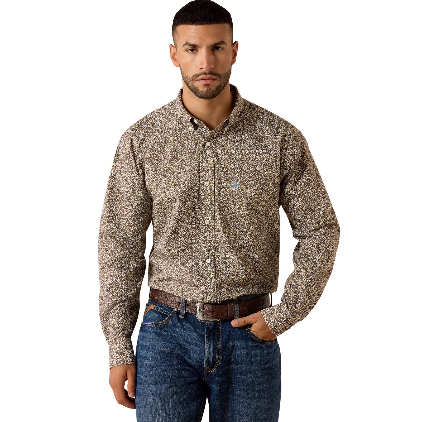A man wearing a long-sleeve western-style button-down shirt with a dense micro-pattern in beige, brown, and black, paired with blue jeans and a brown belt, photographed against a solid white background.