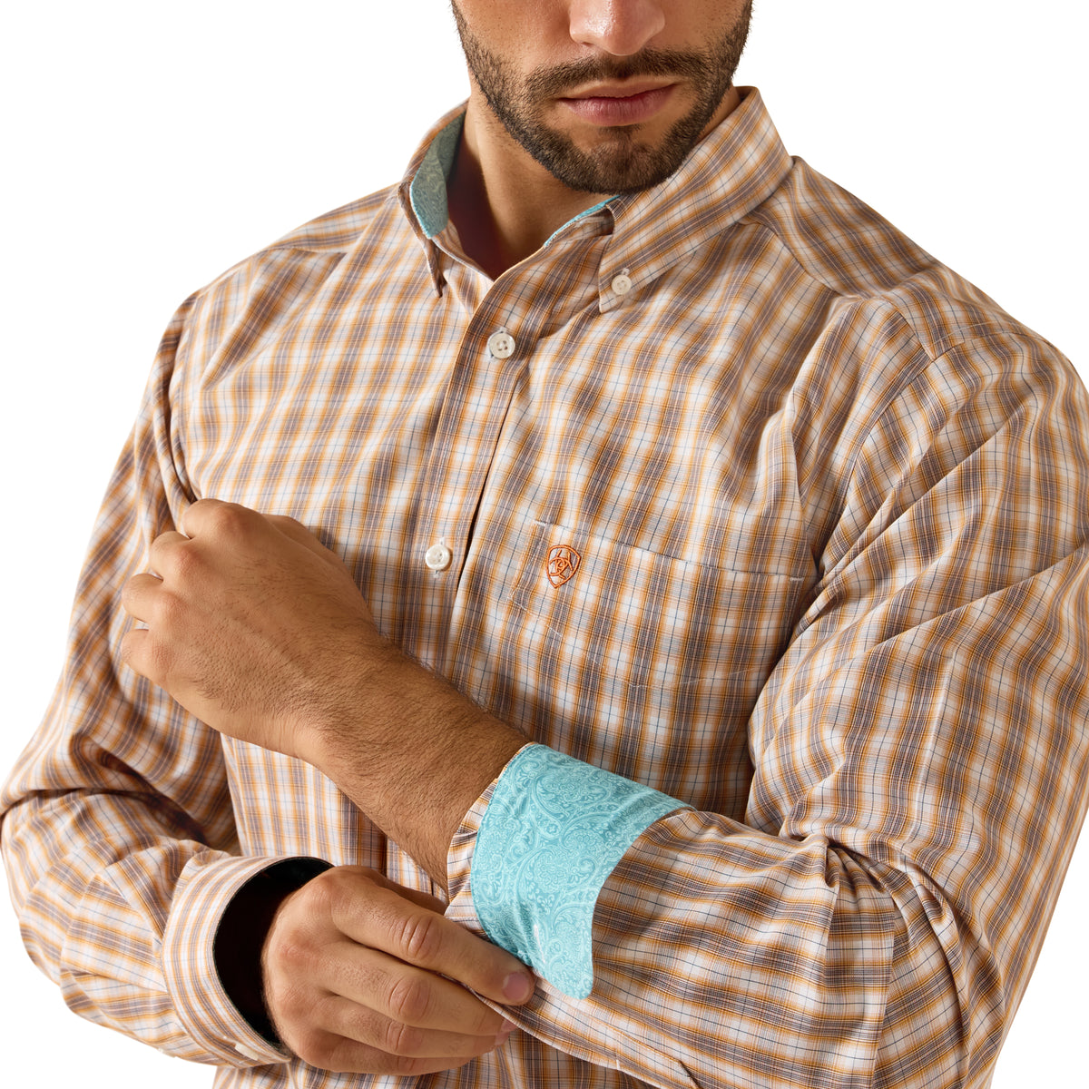 Man wearing a brown checkered shirt with a visible brand logo on a white background