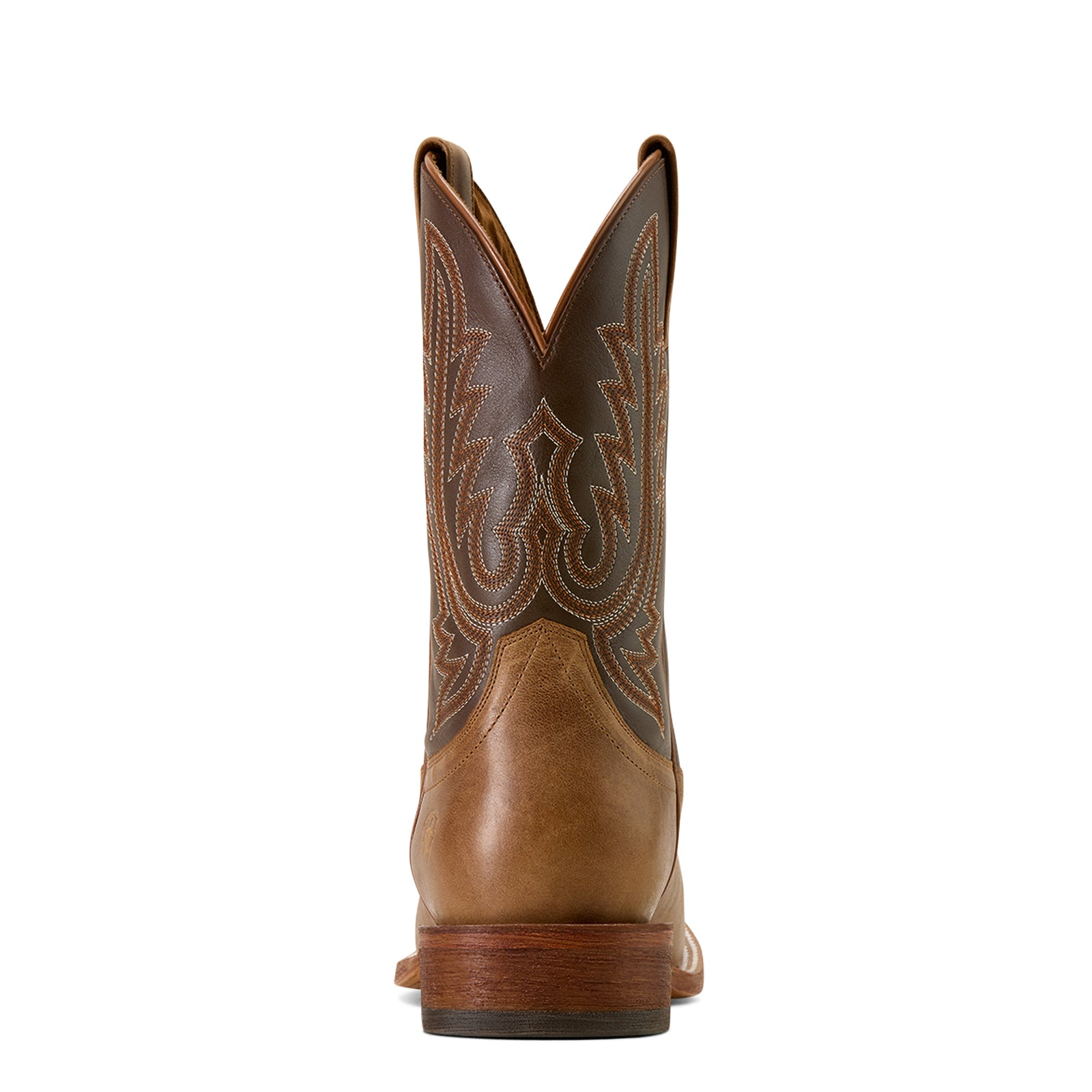 Brown leather cowboy boot with intricate stitching on a white background
