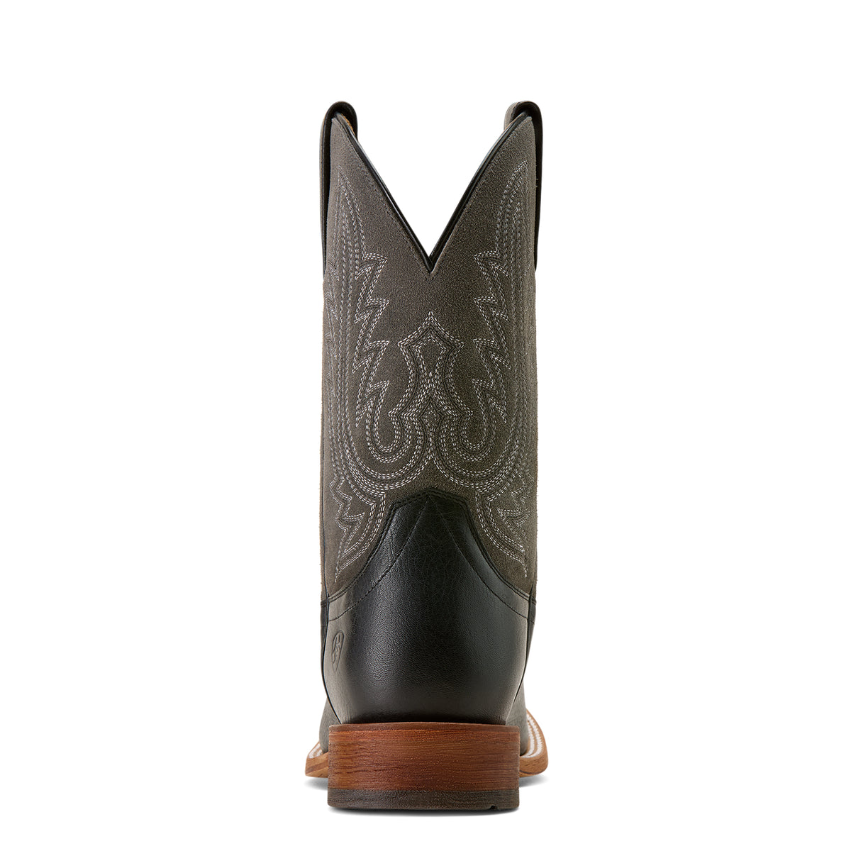 Brown cowboy boot with black sole on a white background