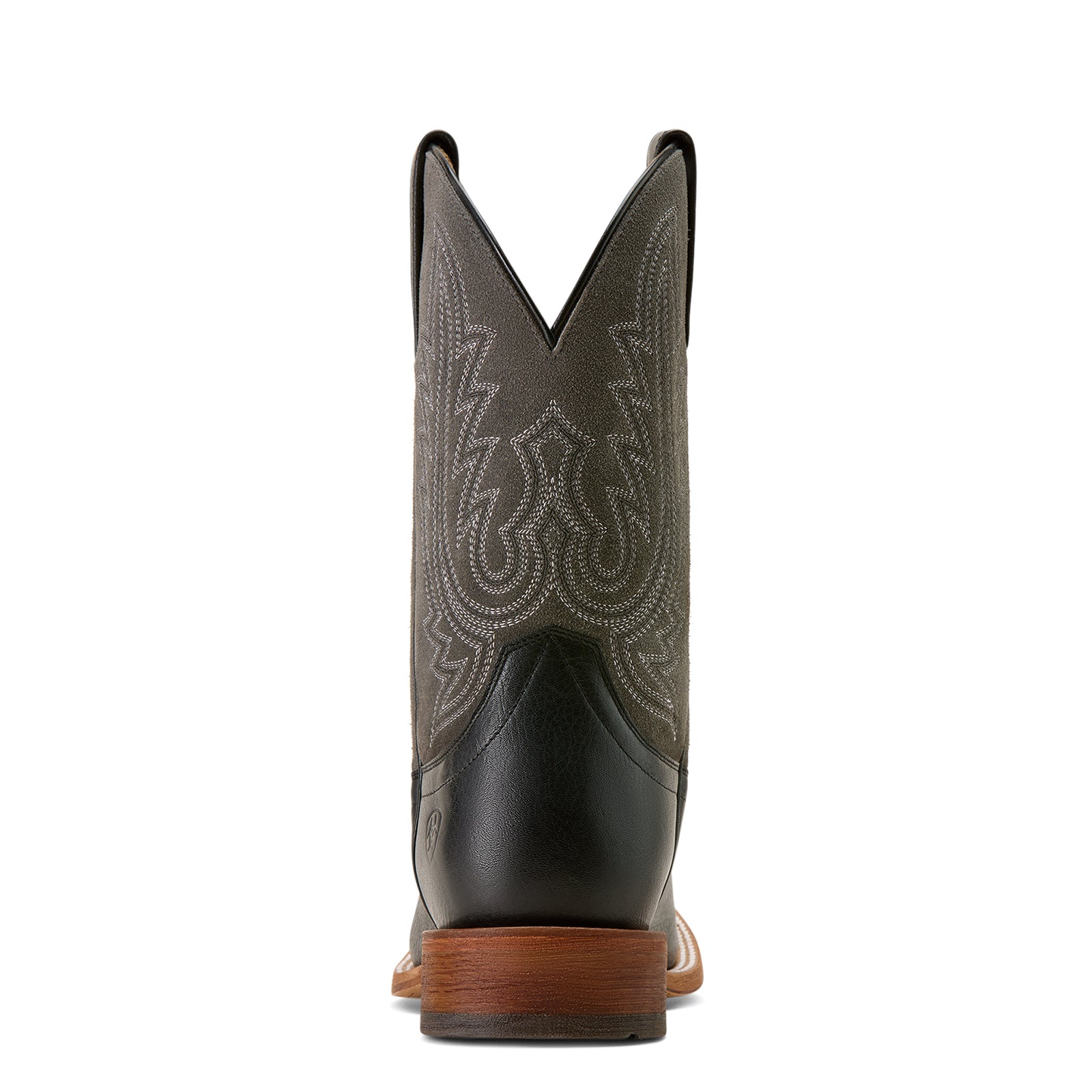 Brown cowboy boot with black sole on a white background