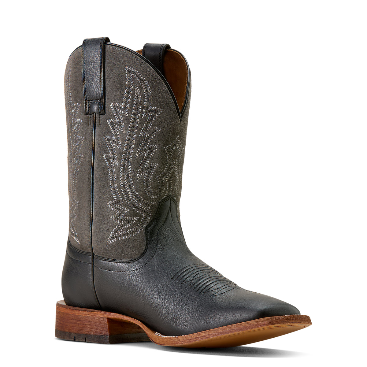 Black cowboy boot with brown sole on a white background